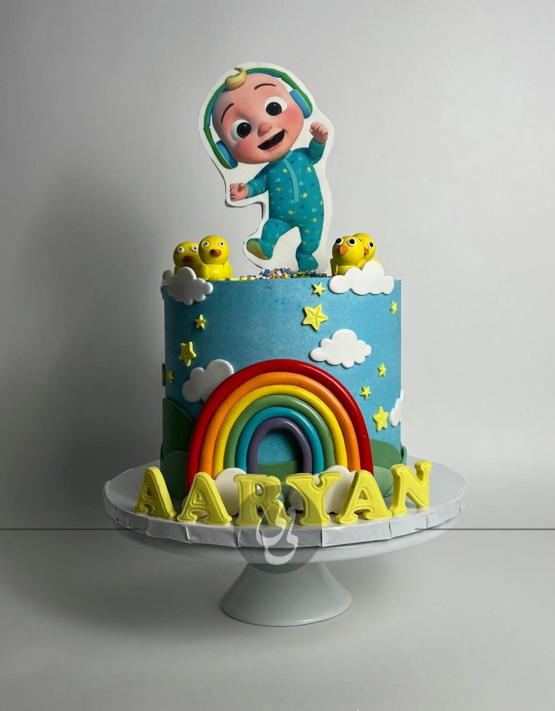 Cocomelon jj & rainbow in edible print - custom cake