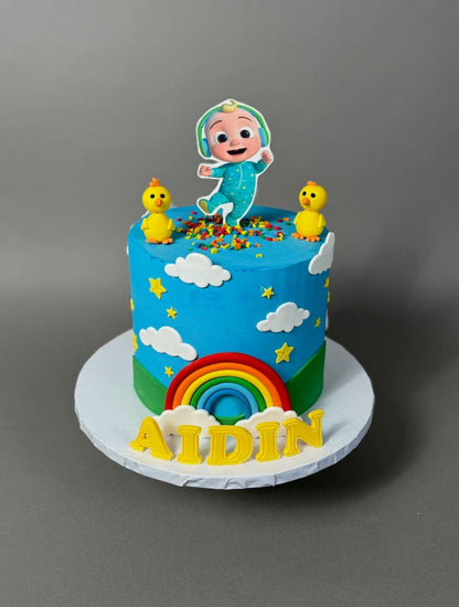 Cocomelon jj &amp; rainbow in edible print - custom cake