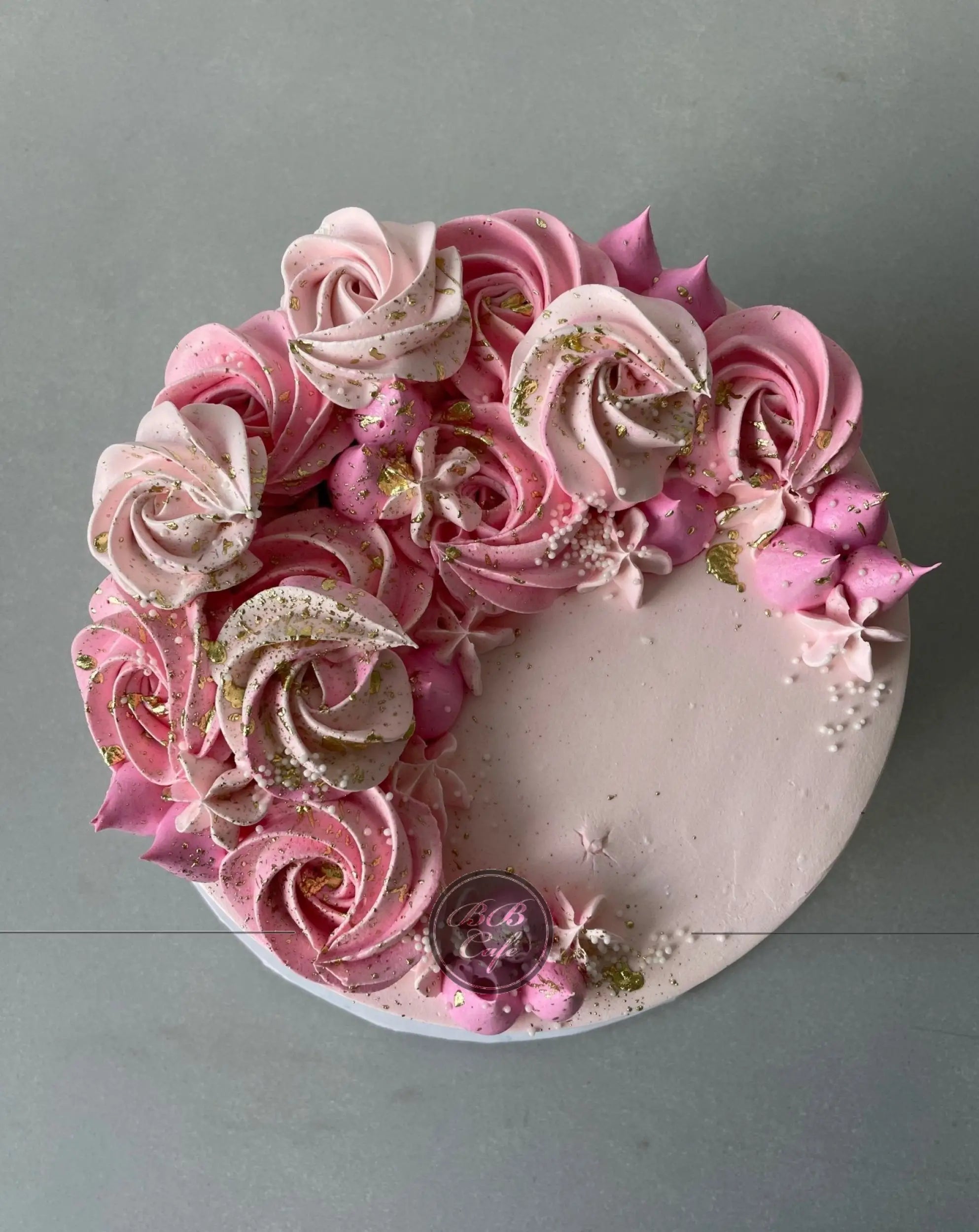 Crescent moon rosettes in whipped cream - custom cake