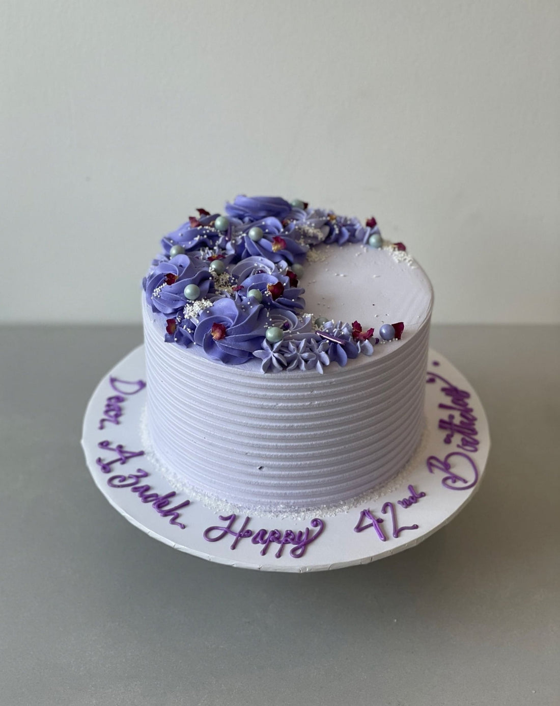 Crescent moon rosettes in whipped cream - custom cake