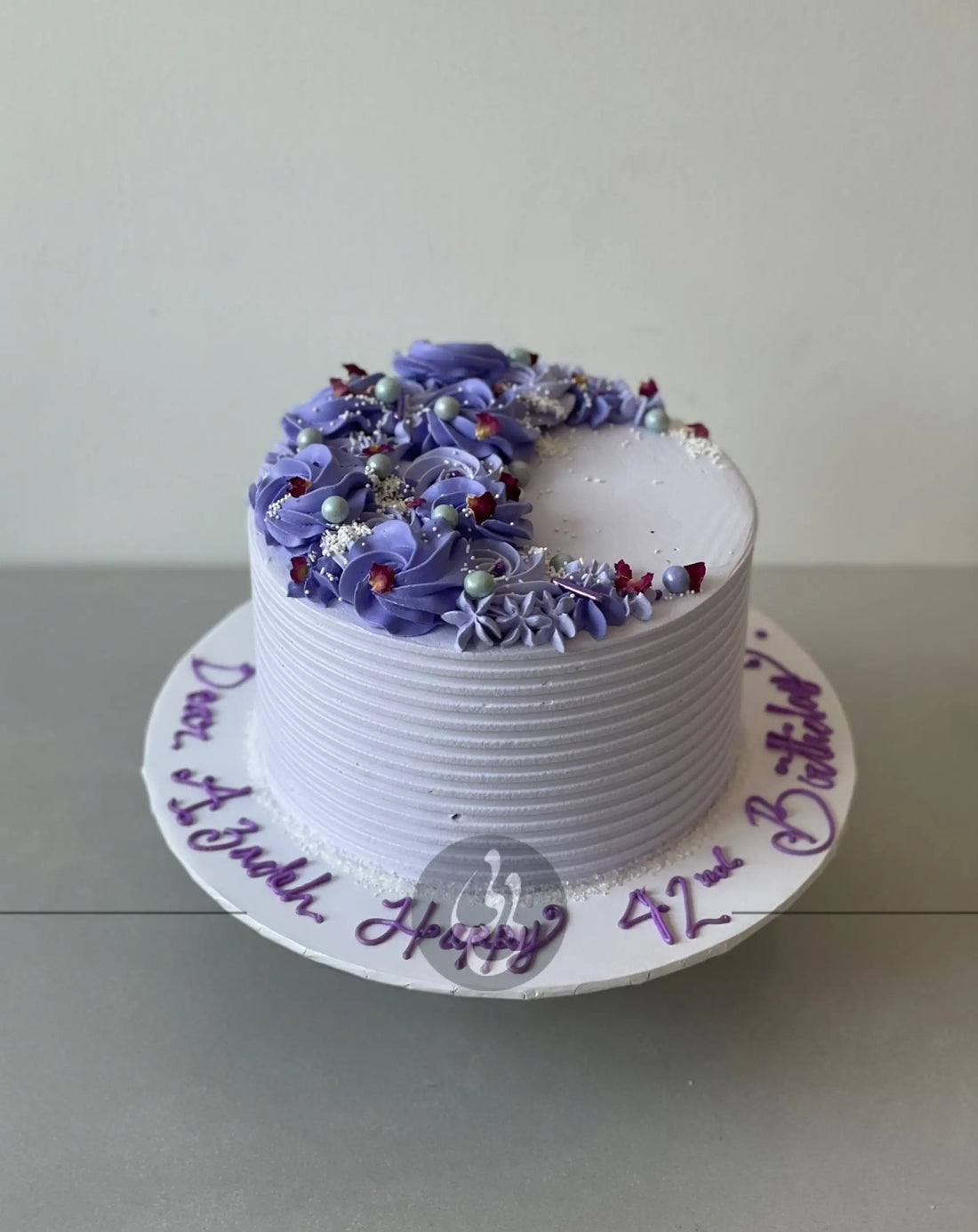 Crescent moon rosettes in whipped cream - custom cake