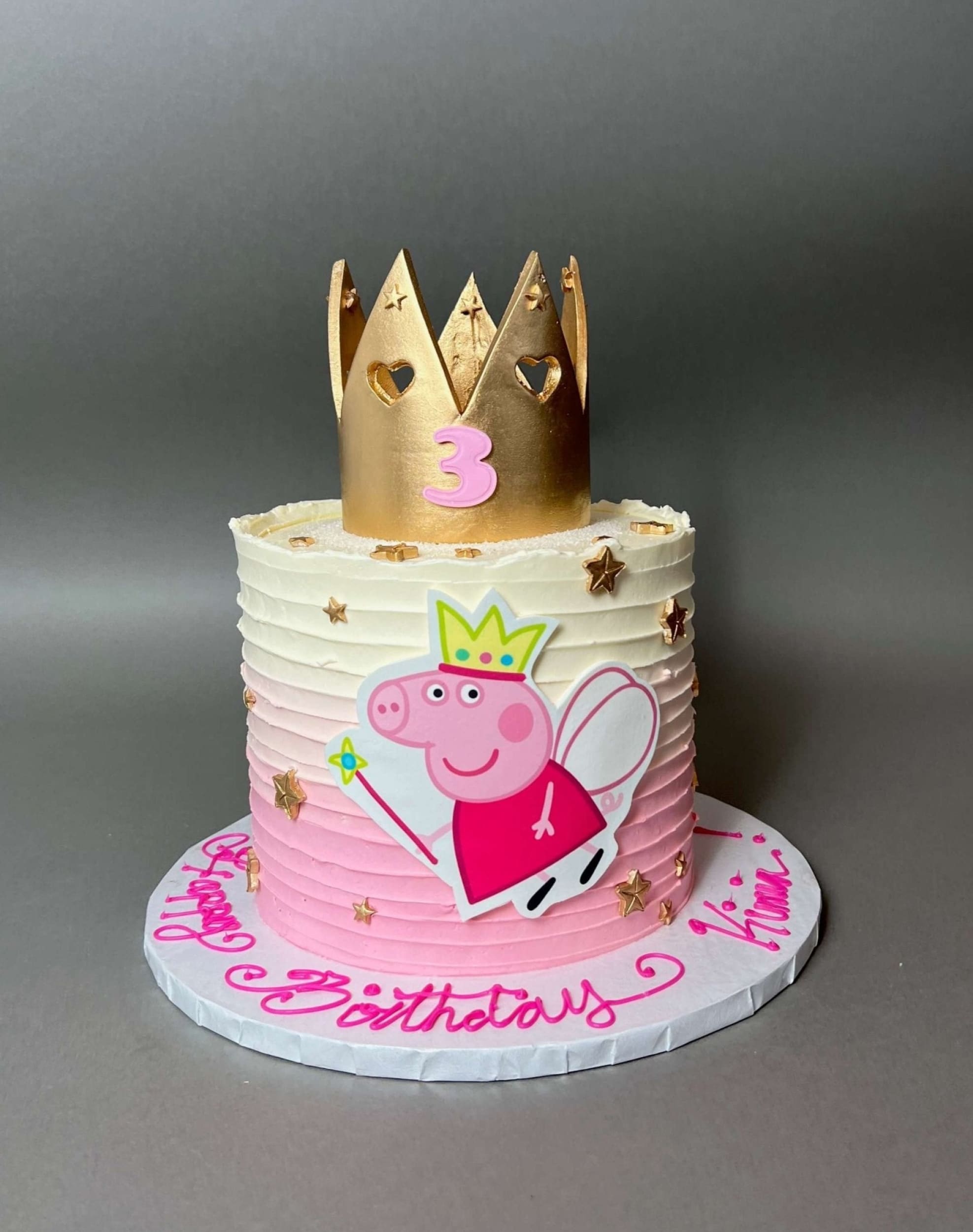 Crown and edible print of peppa pig on buttercream - custom cake