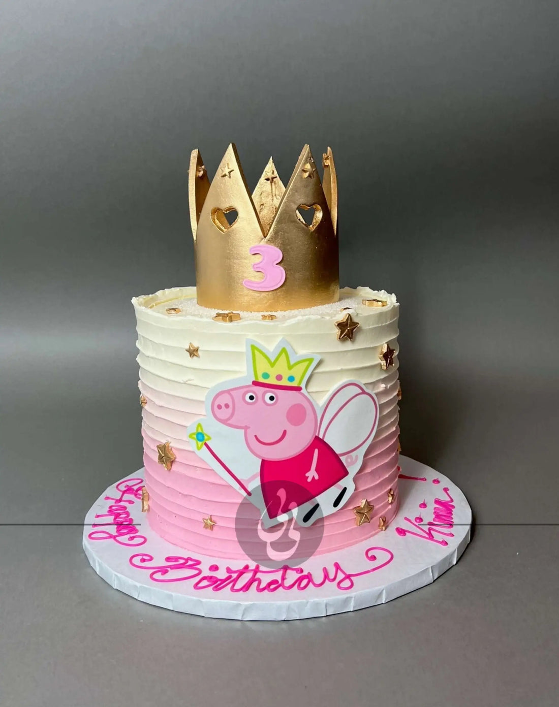 Crown and edible print of peppa pig on buttercream - custom cake