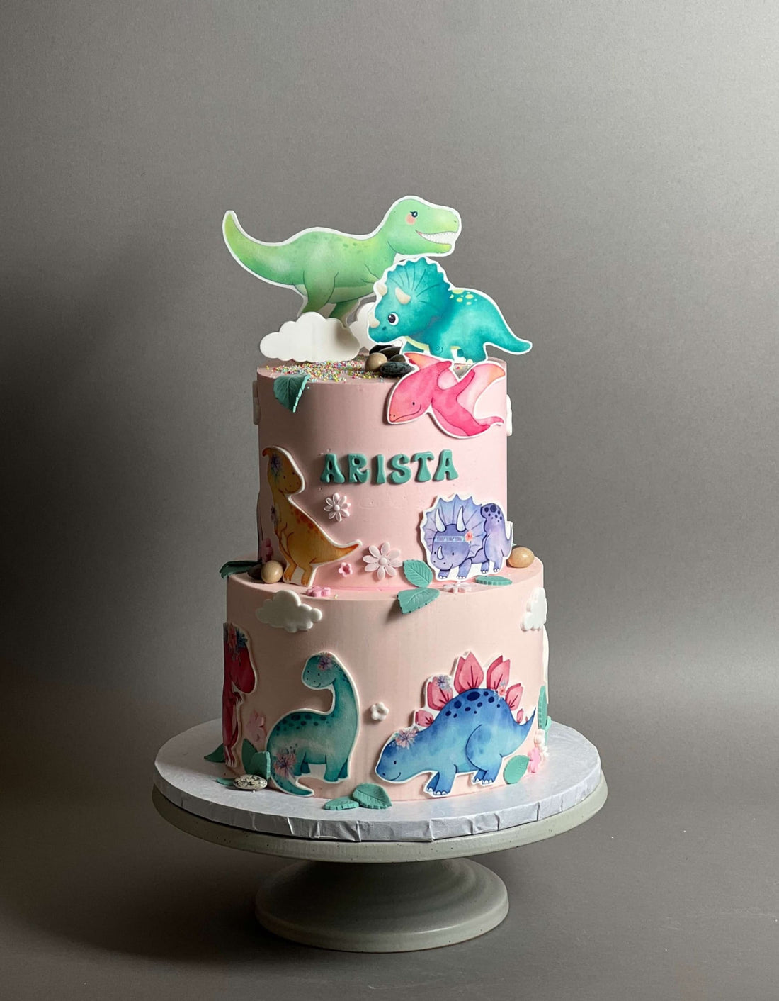 Dinosaur images on buttercream - custom cake