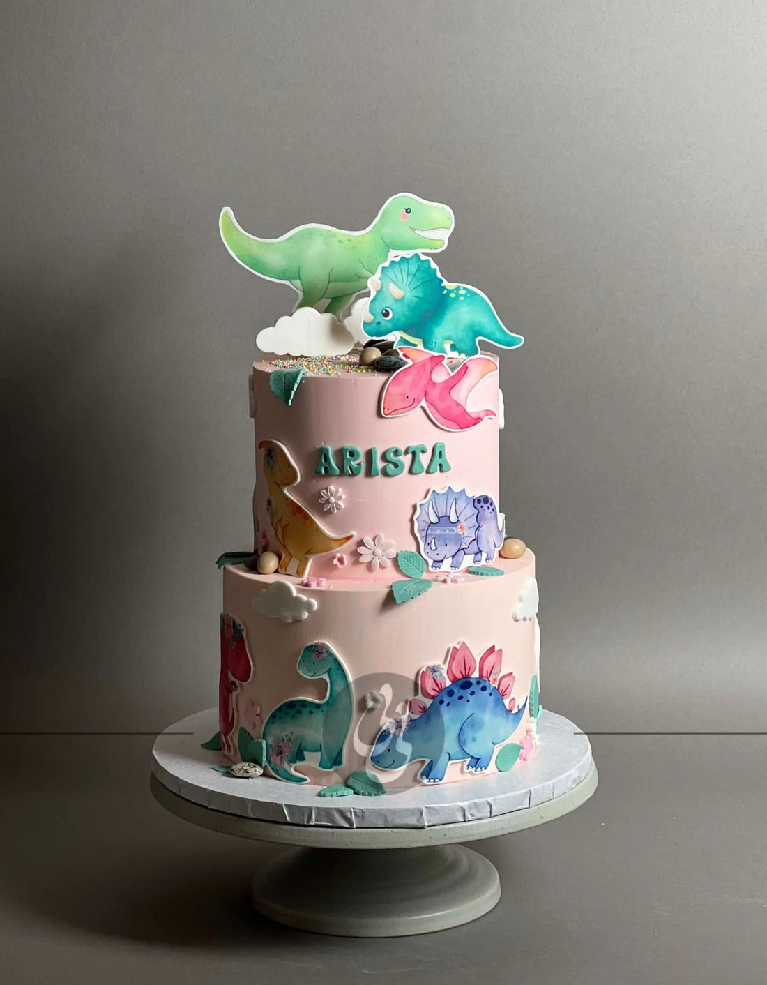 Dinosaur images on buttercream - custom cake