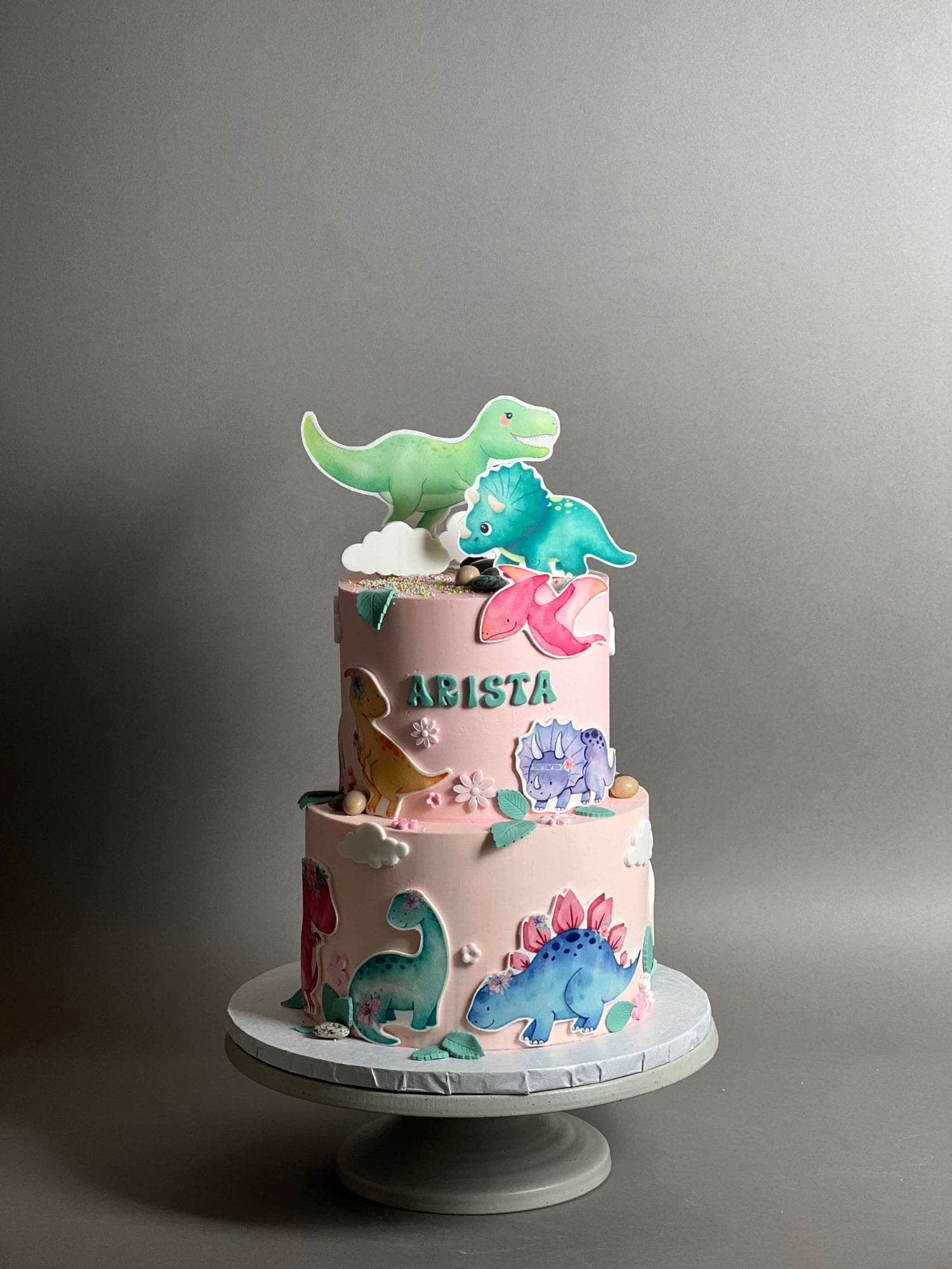 Dinosaur images on buttercream - custom cake