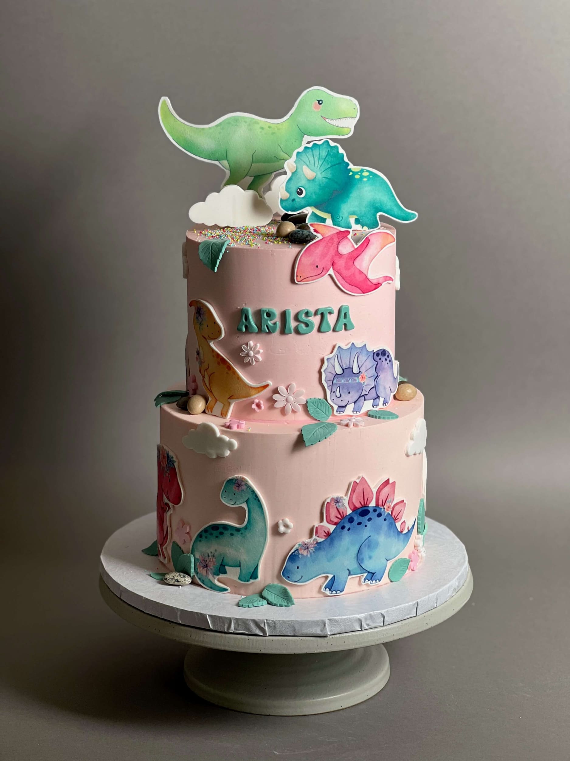 Dinosaur images on buttercream - custom cake