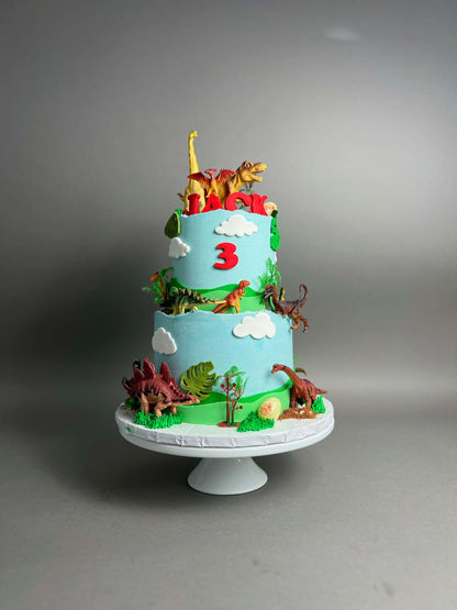 Dinosaur toys on buttercream - custom cake