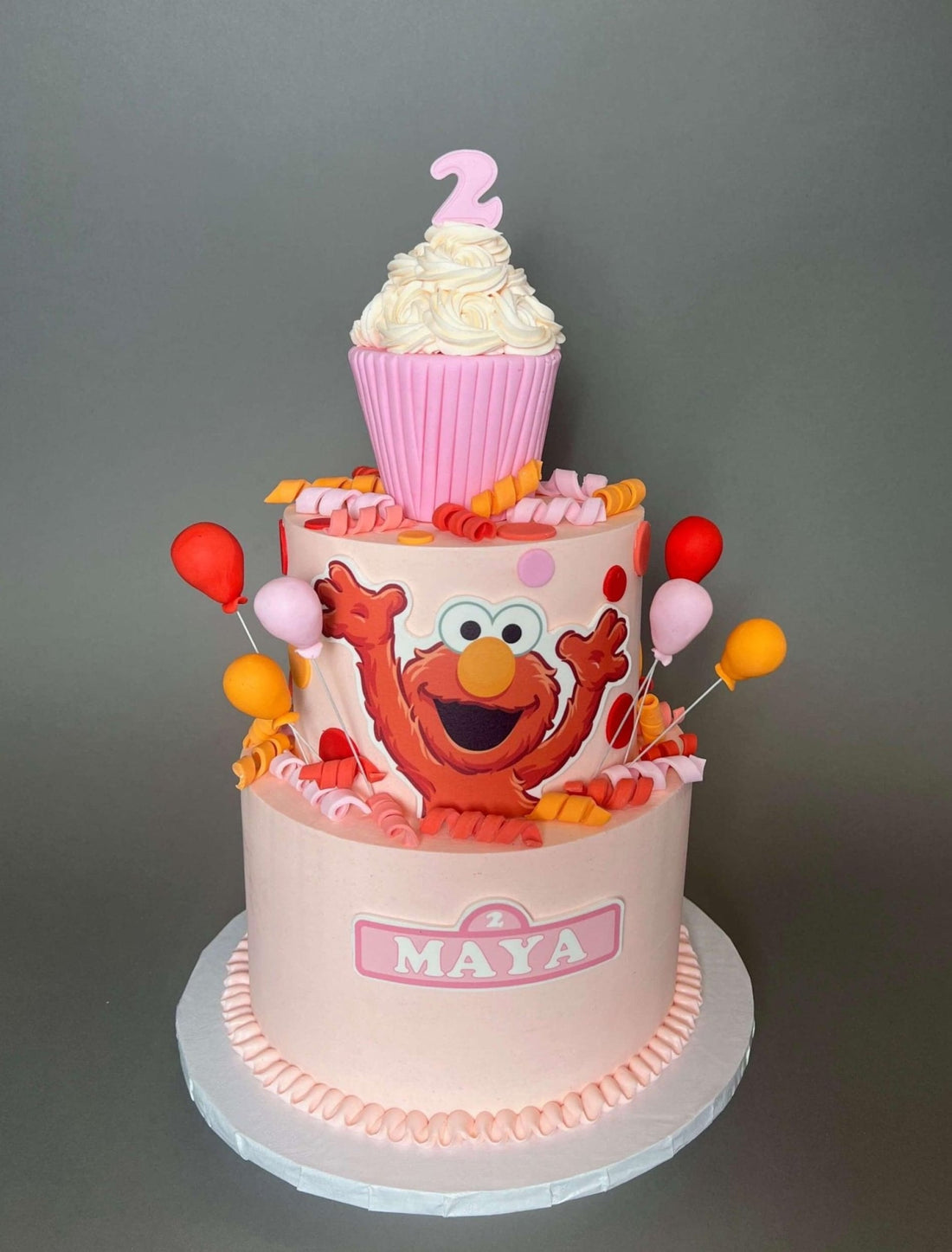 Elmo &amp; cupcake on buttercream - custom cake