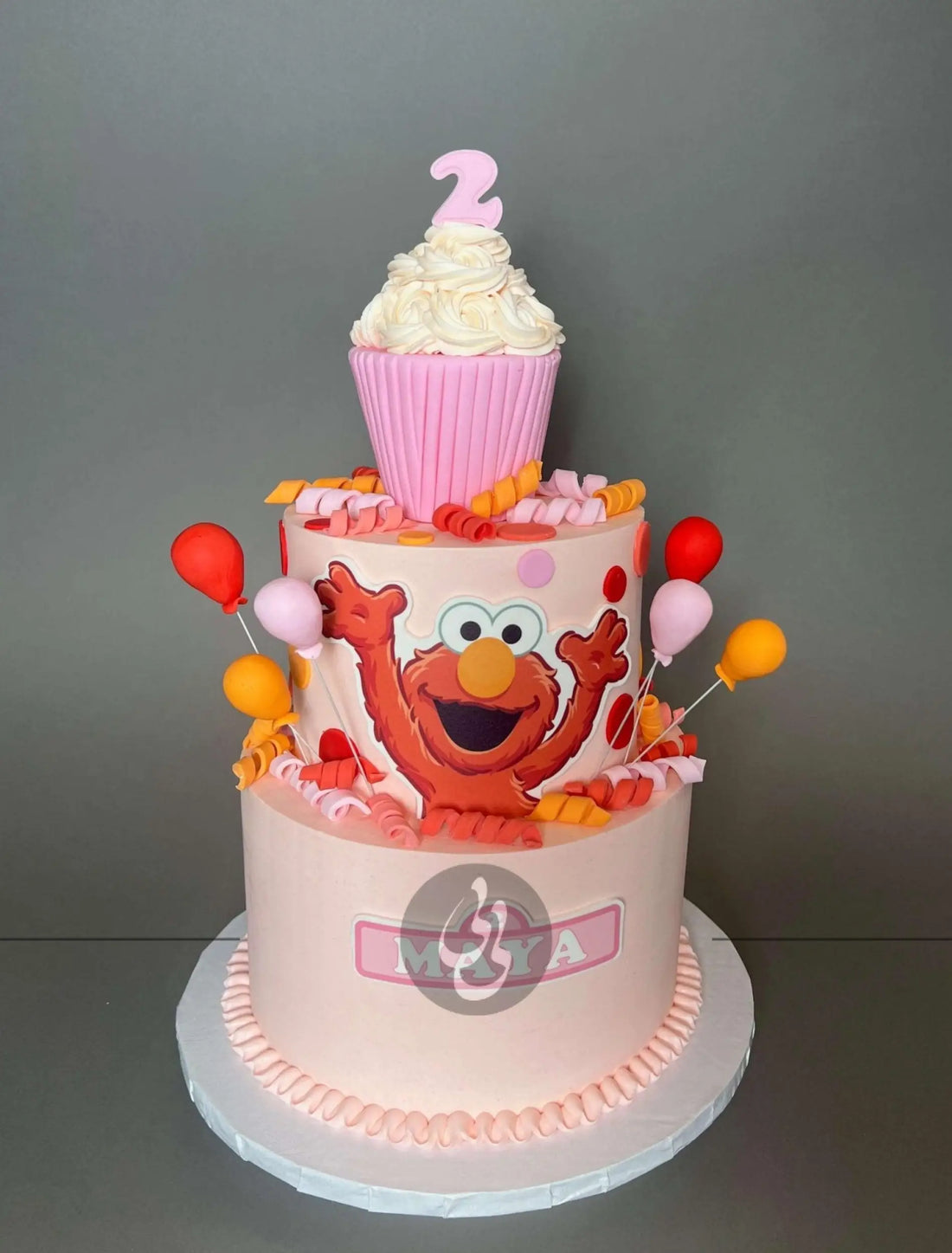 Elmo &amp; cupcake on buttercream - custom cake