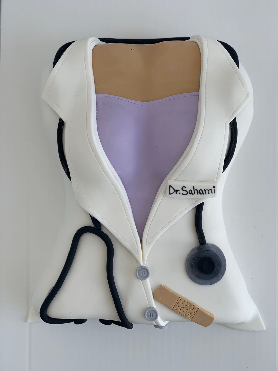 Female doctor coat - custom cake