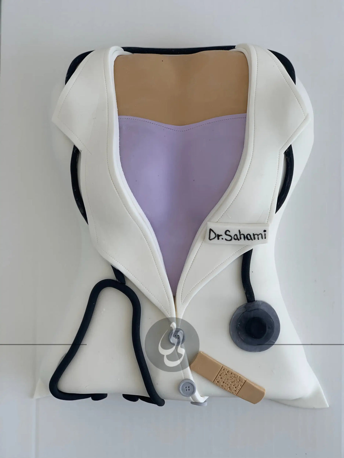 Female doctor coat - custom cake