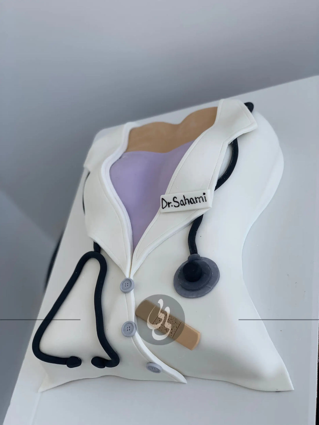 Female doctor coat - custom cake