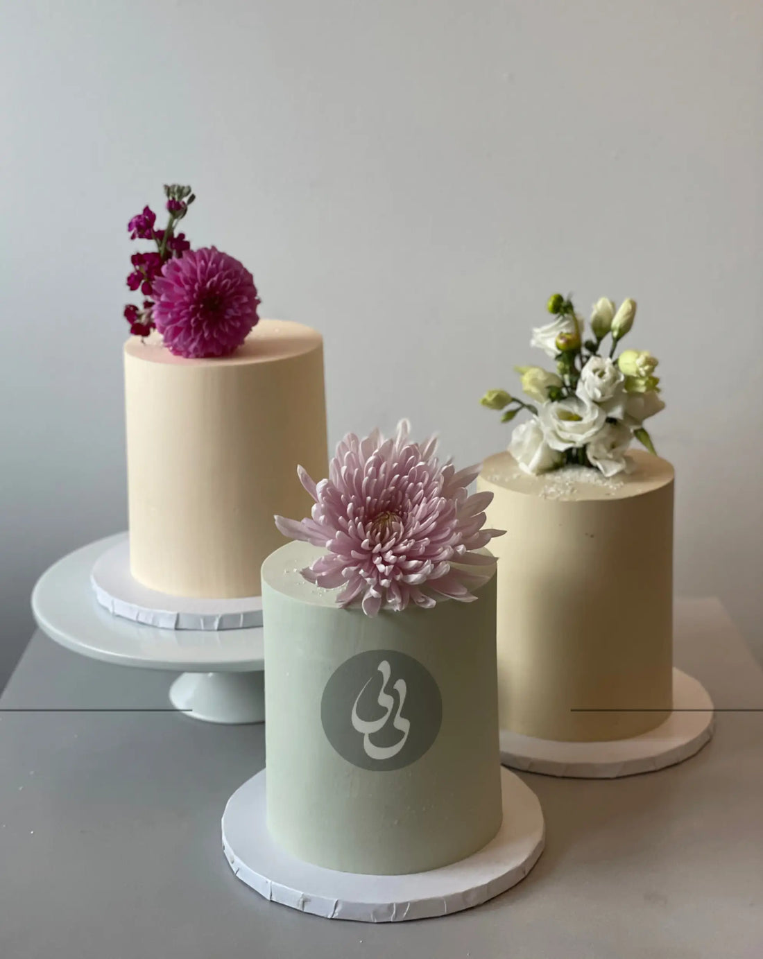 Fresh blooms on buttercream - wedding cake