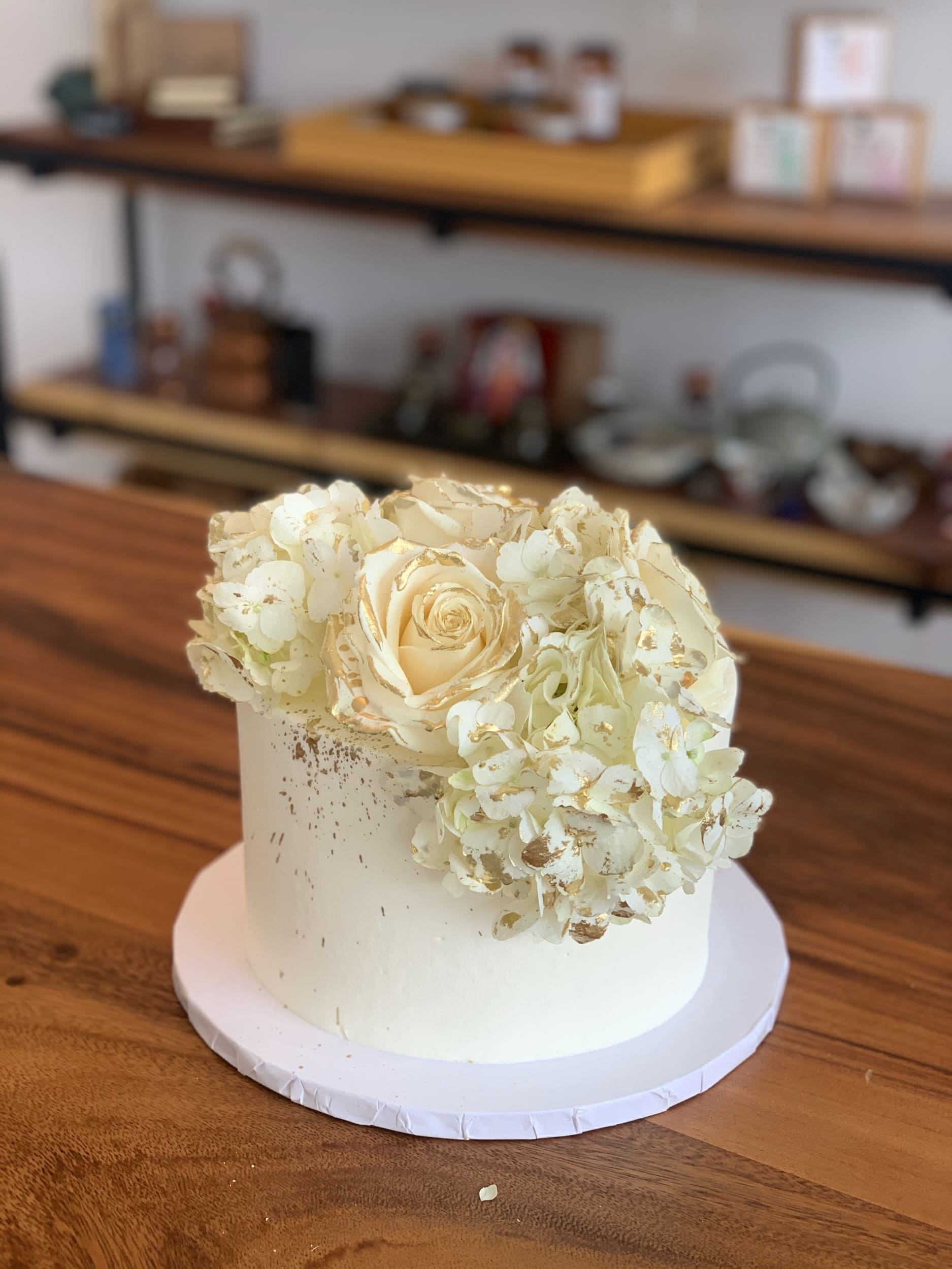 Fresh flowers on whipped cream - custom cake