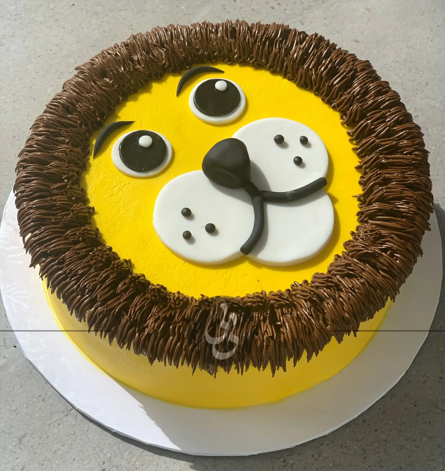 Furry animal friend on whipped cream - custom cake