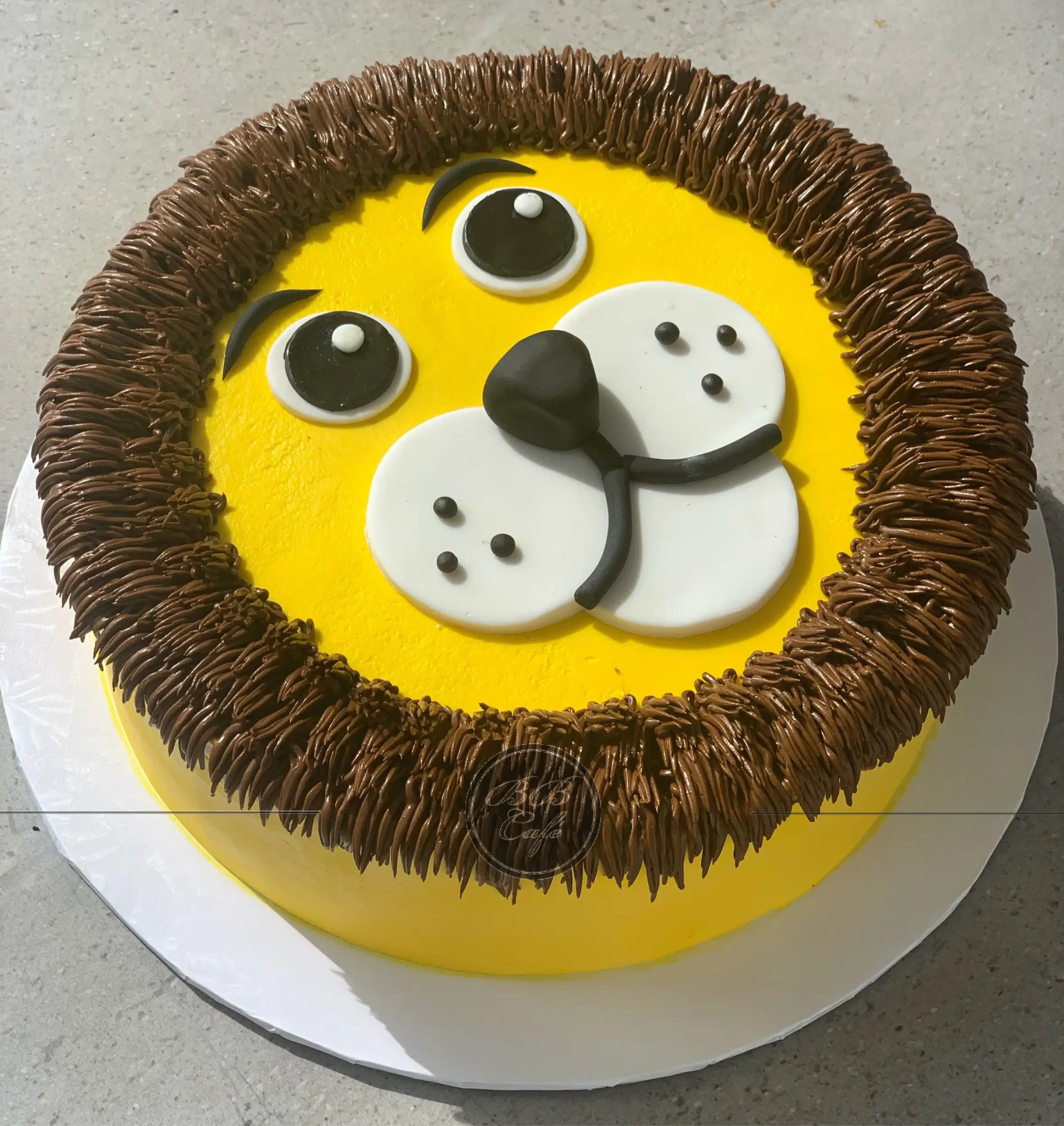 Furry animal friend on whipped cream - custom cake