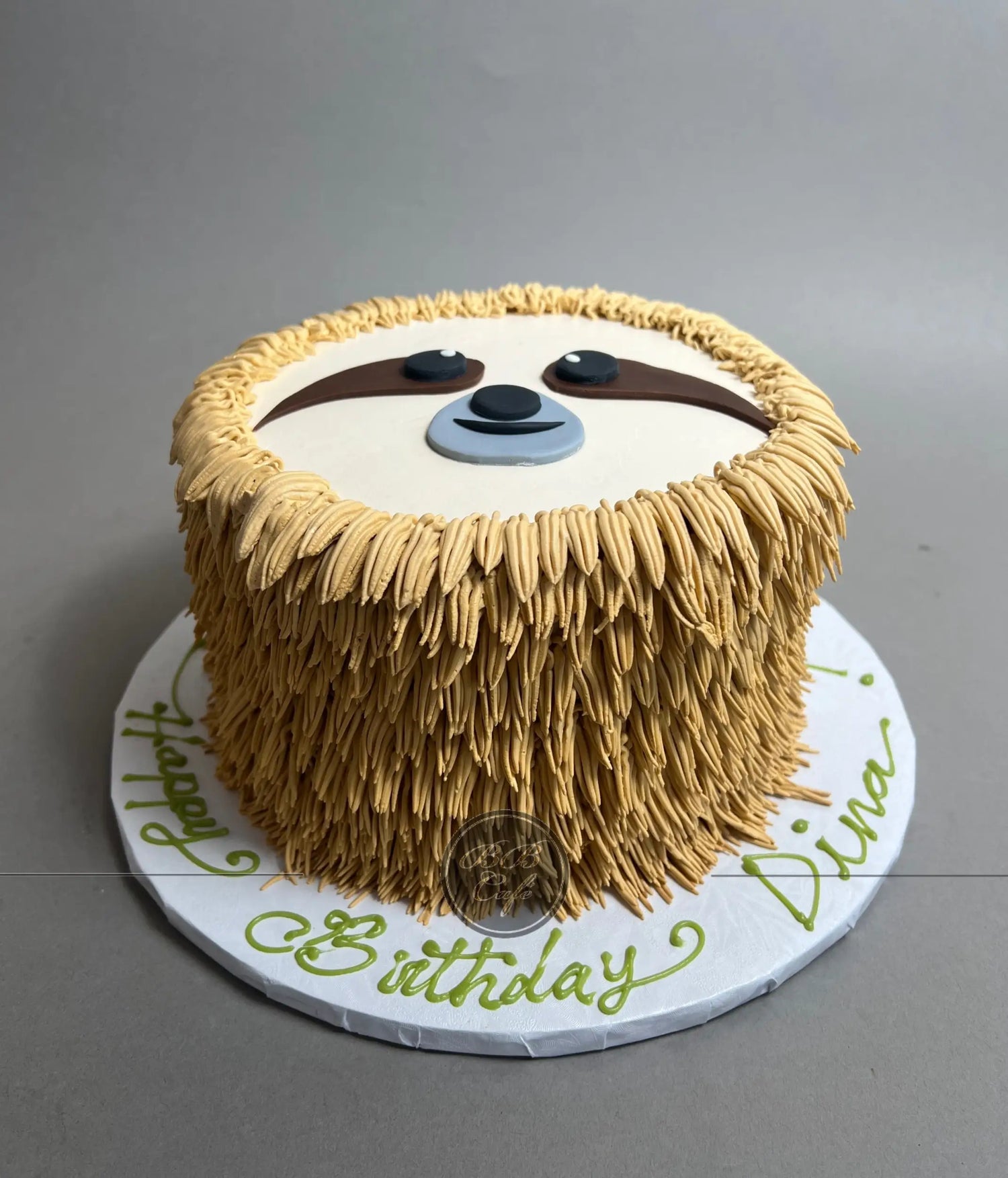 Furry animal friend on whipped cream - custom cake