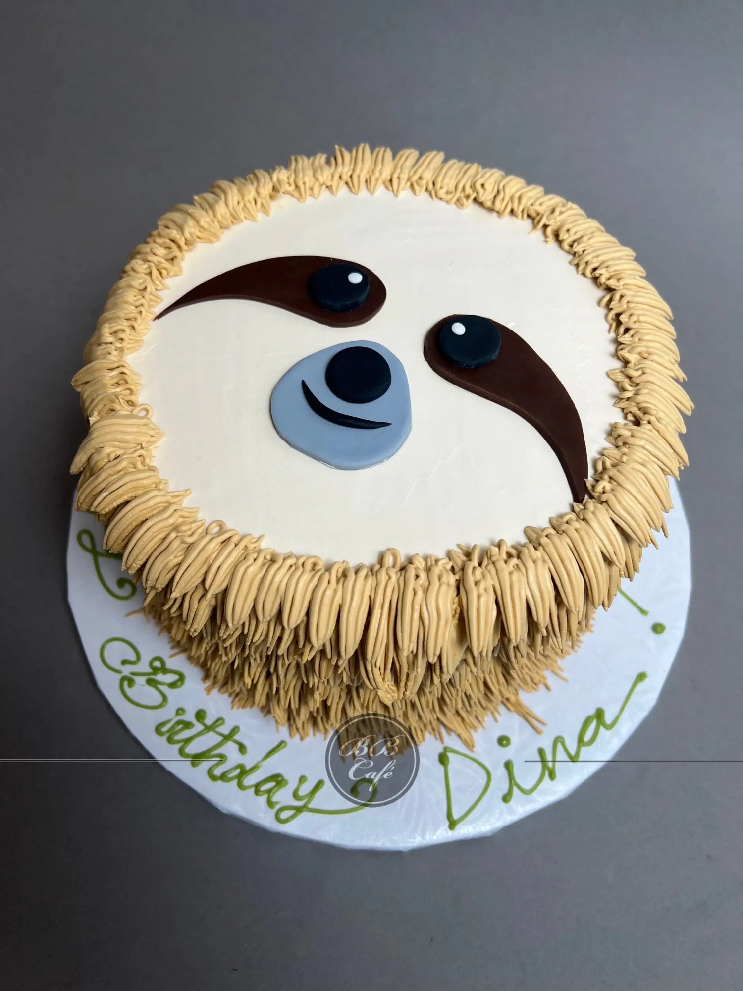 Furry animal friend on whipped cream - custom cake