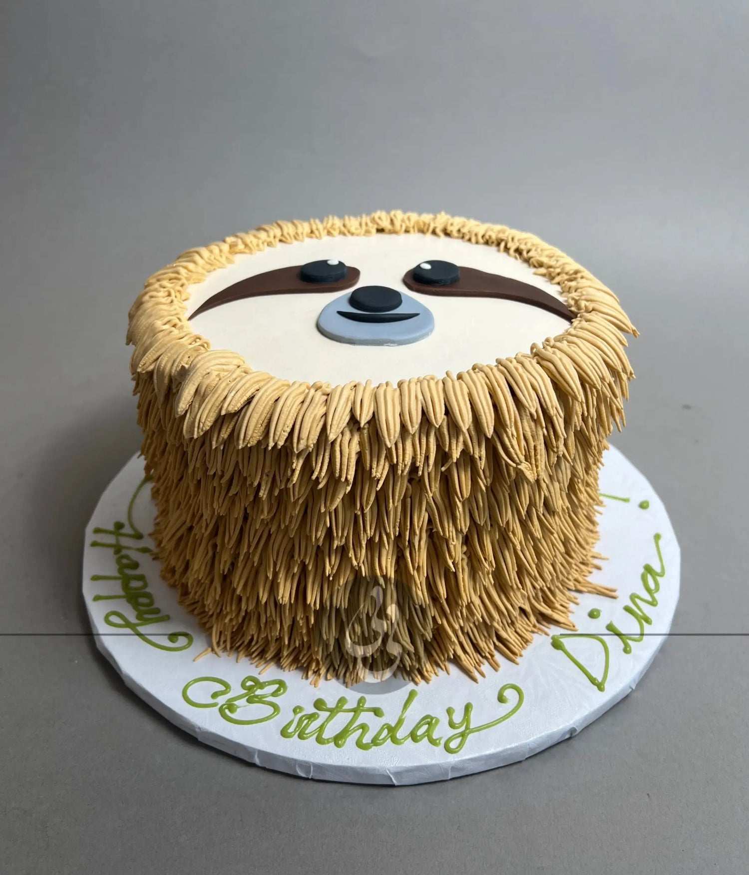 Furry animal friend on whipped cream - custom cake