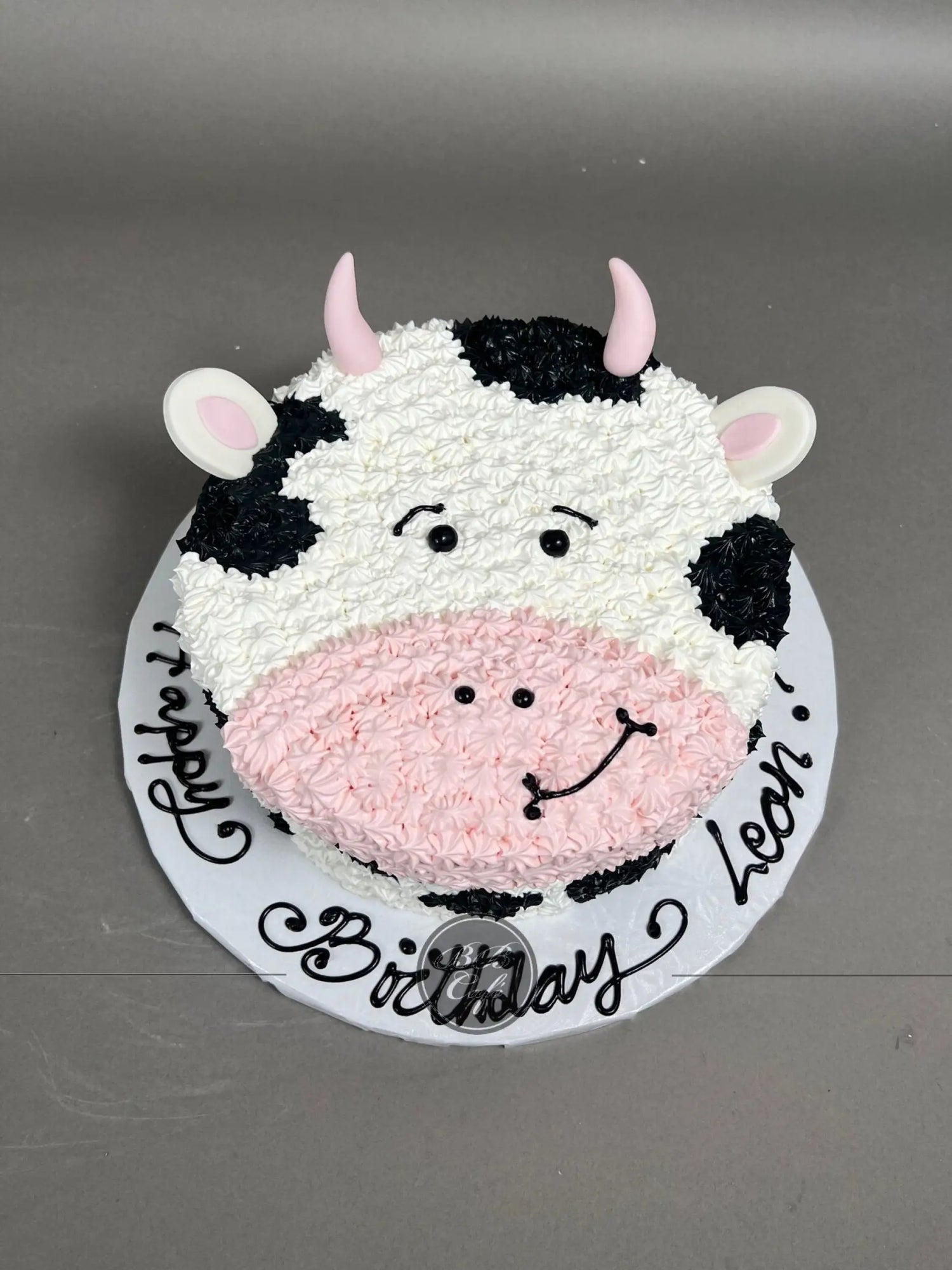 Furry animal friend on whipped cream - custom cake