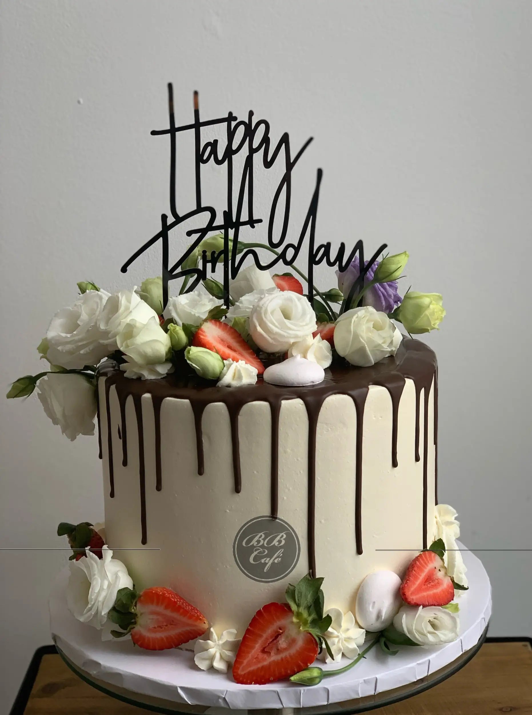 Ganache drips &amp; fresh flowers - custom cake