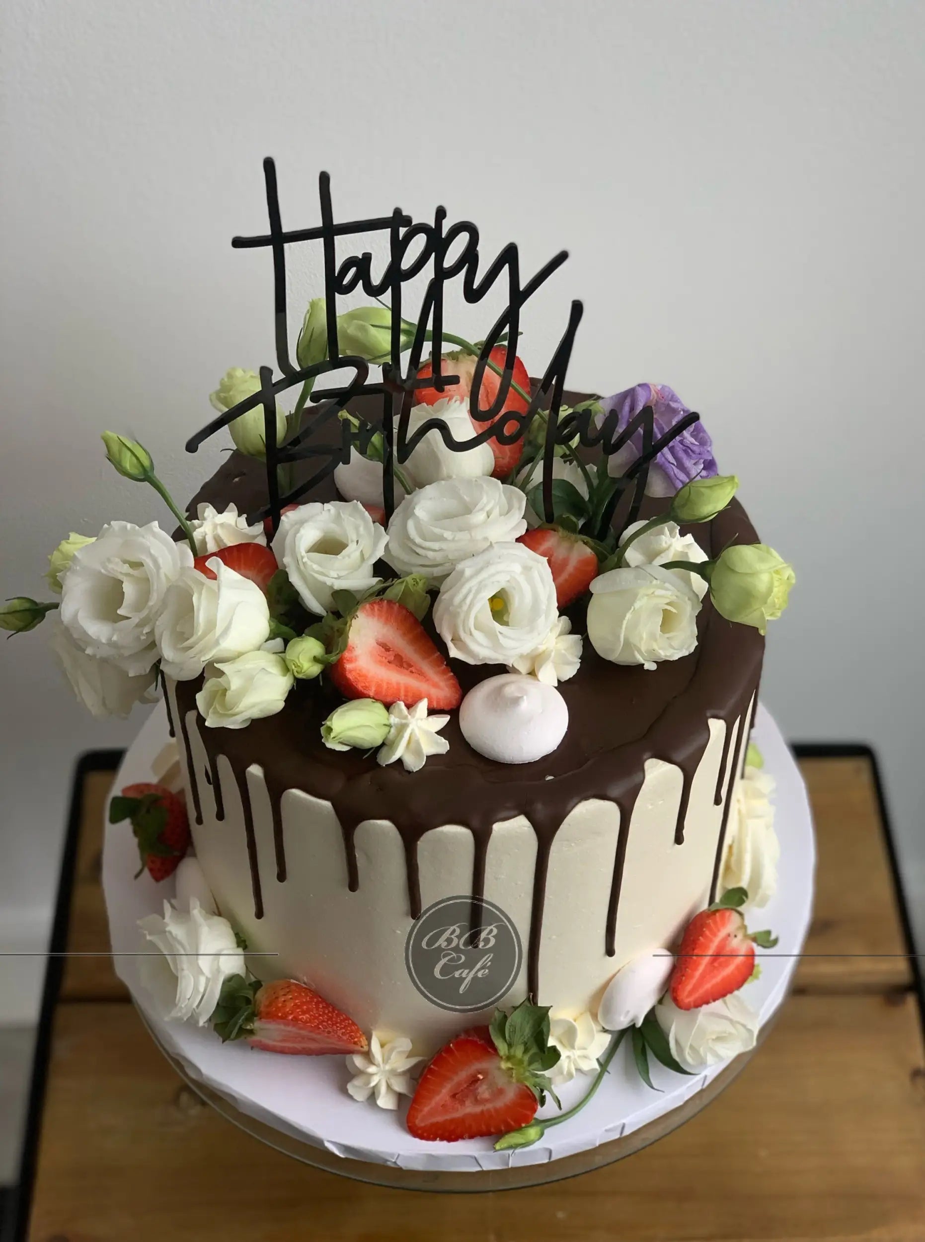 Ganache drips &amp; fresh flowers - custom cake