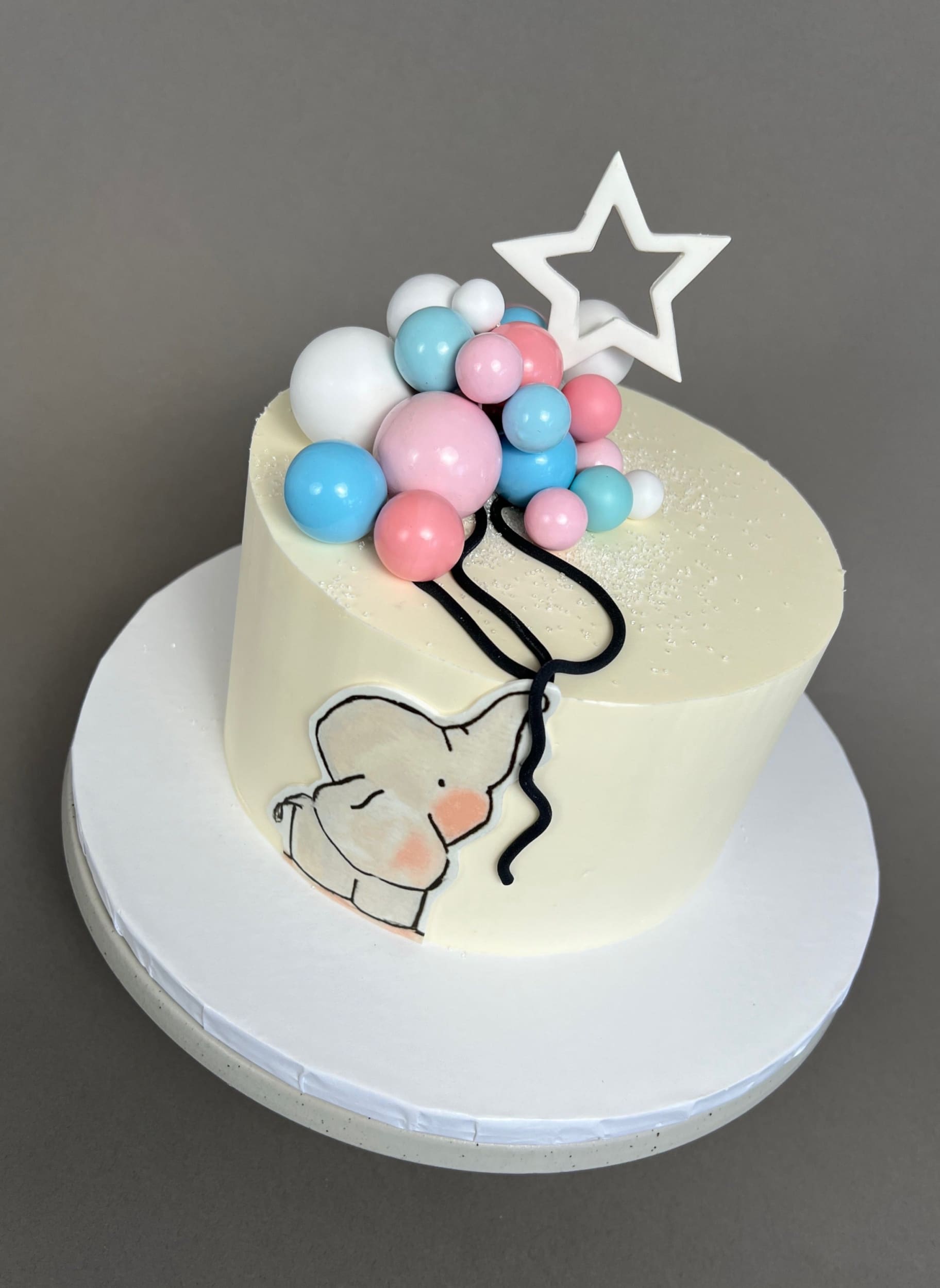 Gender reveal baby animal &amp; spheres - custom cake