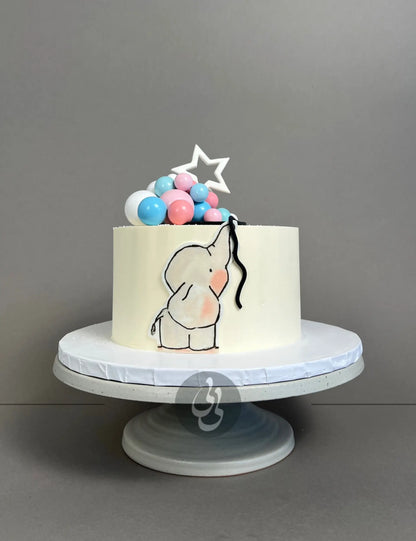 Gender reveal baby animal &amp; spheres - custom cake