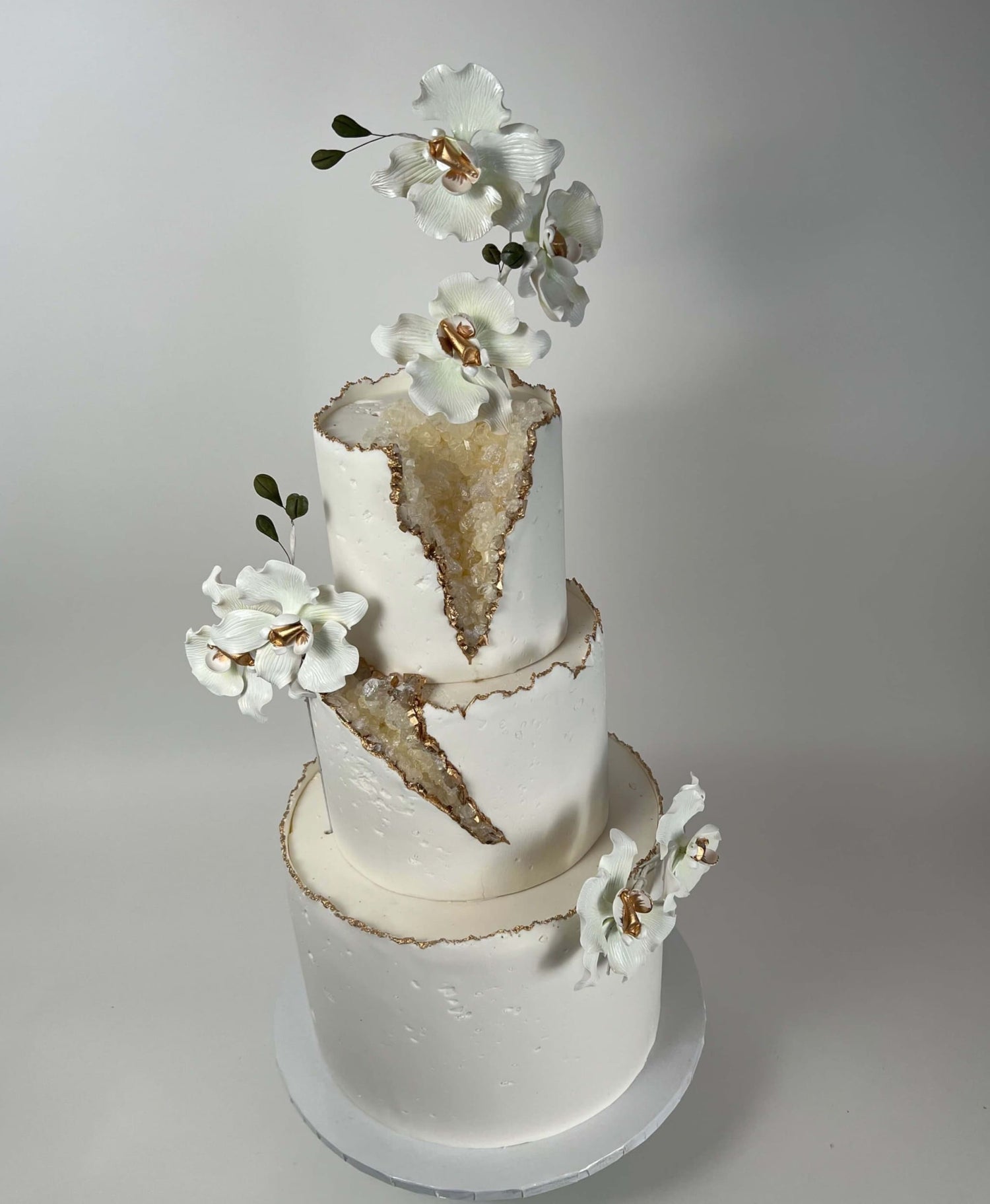 Geode and sugar orchids - wedding cake