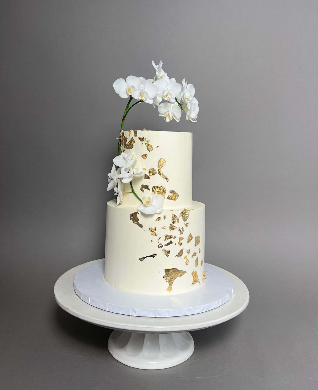 Gold foil fresh orchids - wedding cake