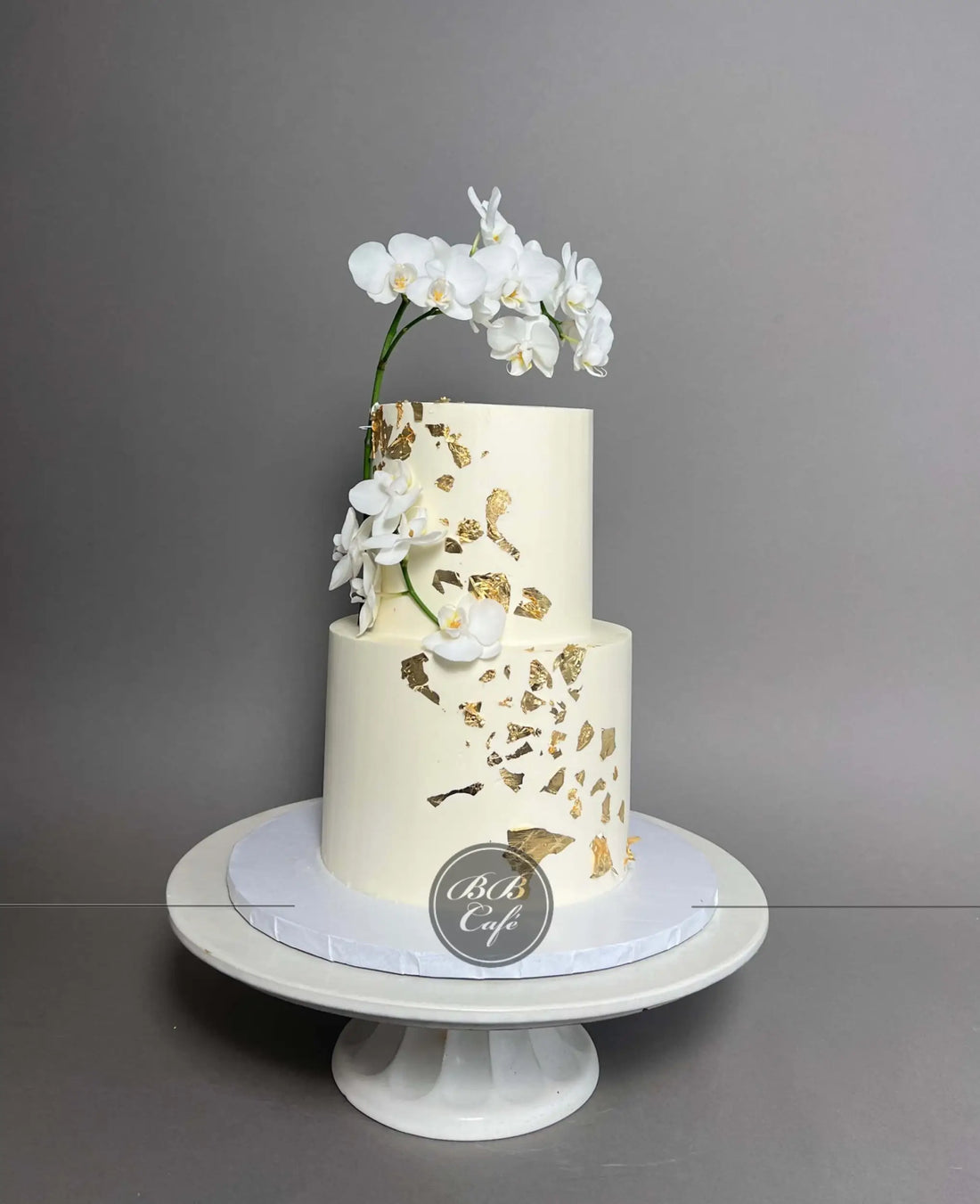 Gold foil fresh orchids - wedding cake