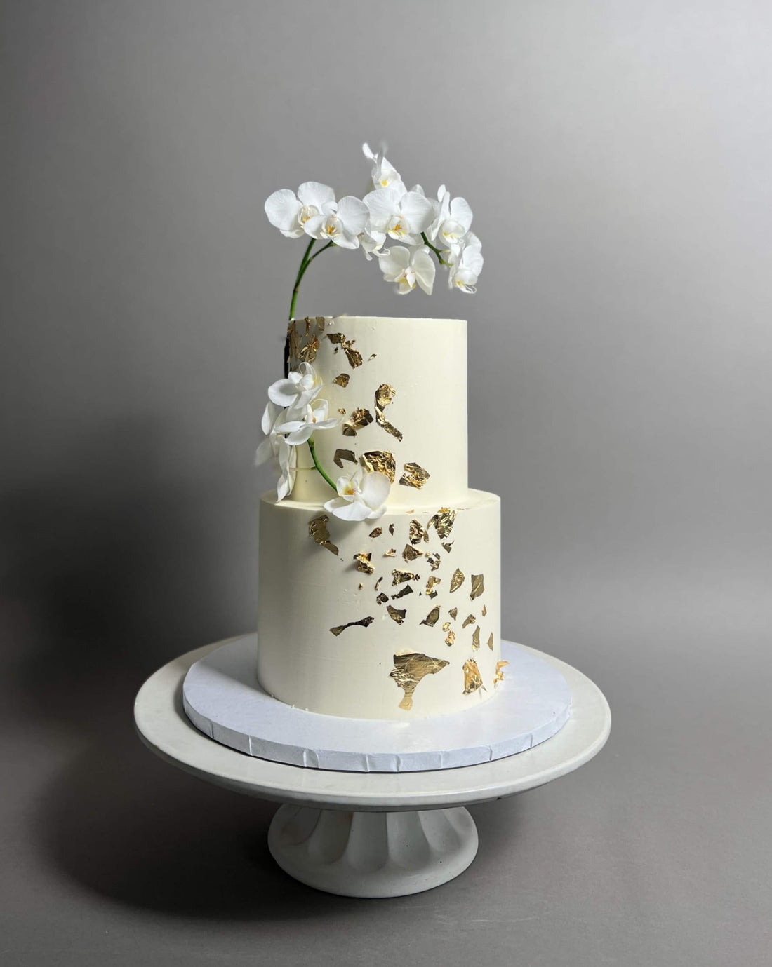 Gold foil fresh orchids - wedding cake