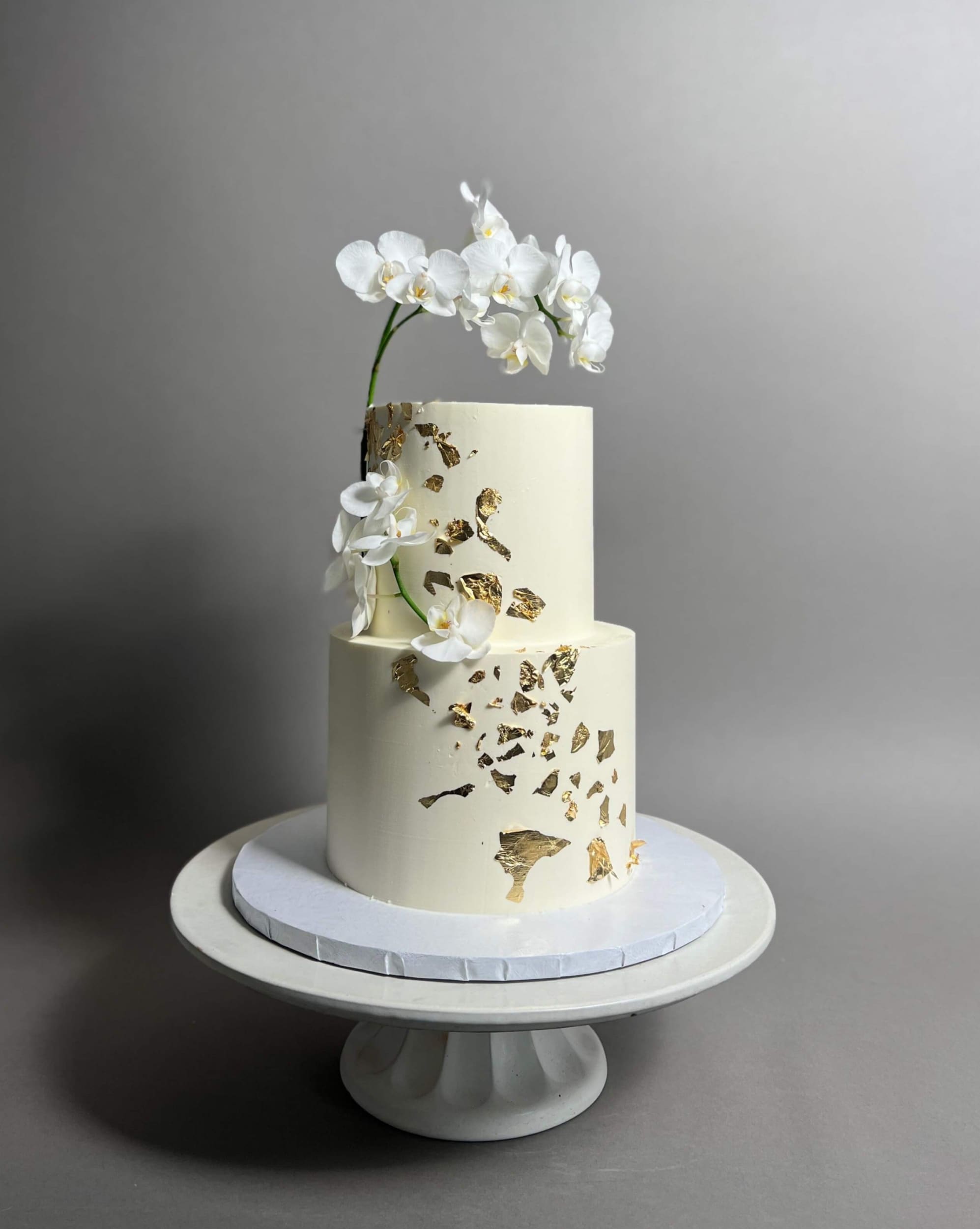Gold foil fresh orchids - wedding cake