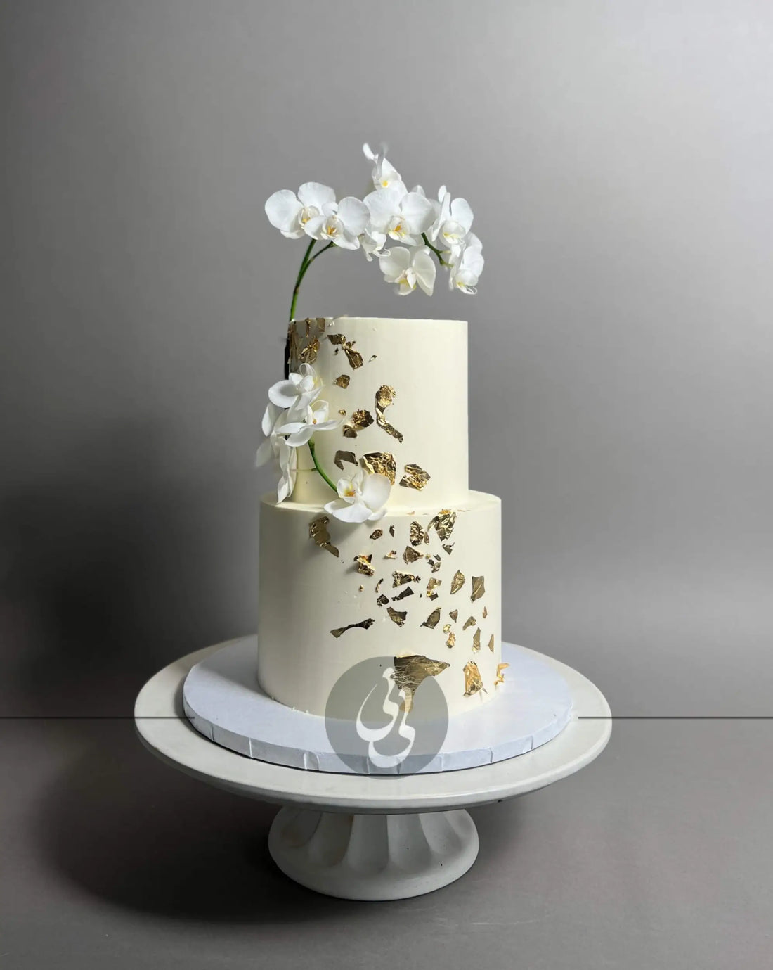 Gold foil fresh orchids - wedding cake
