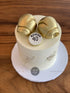 Golden boxing gloves on buttercream - custom cake