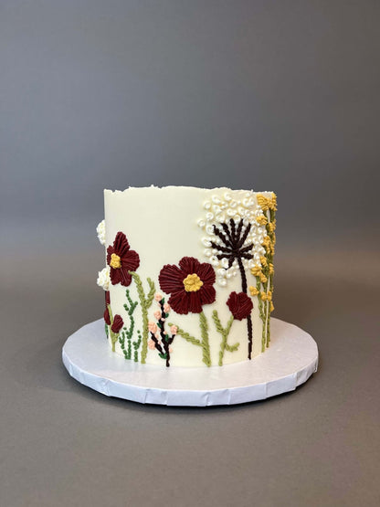 Hand piped embroidery on buttercream - custom cake
