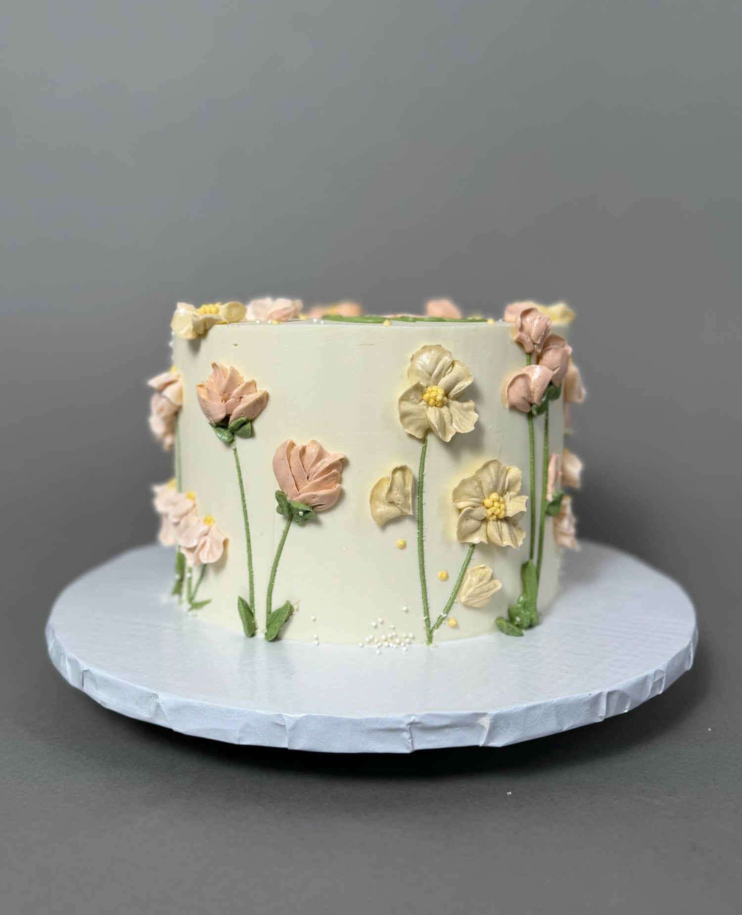 Hand piped flower meadow - custom cake