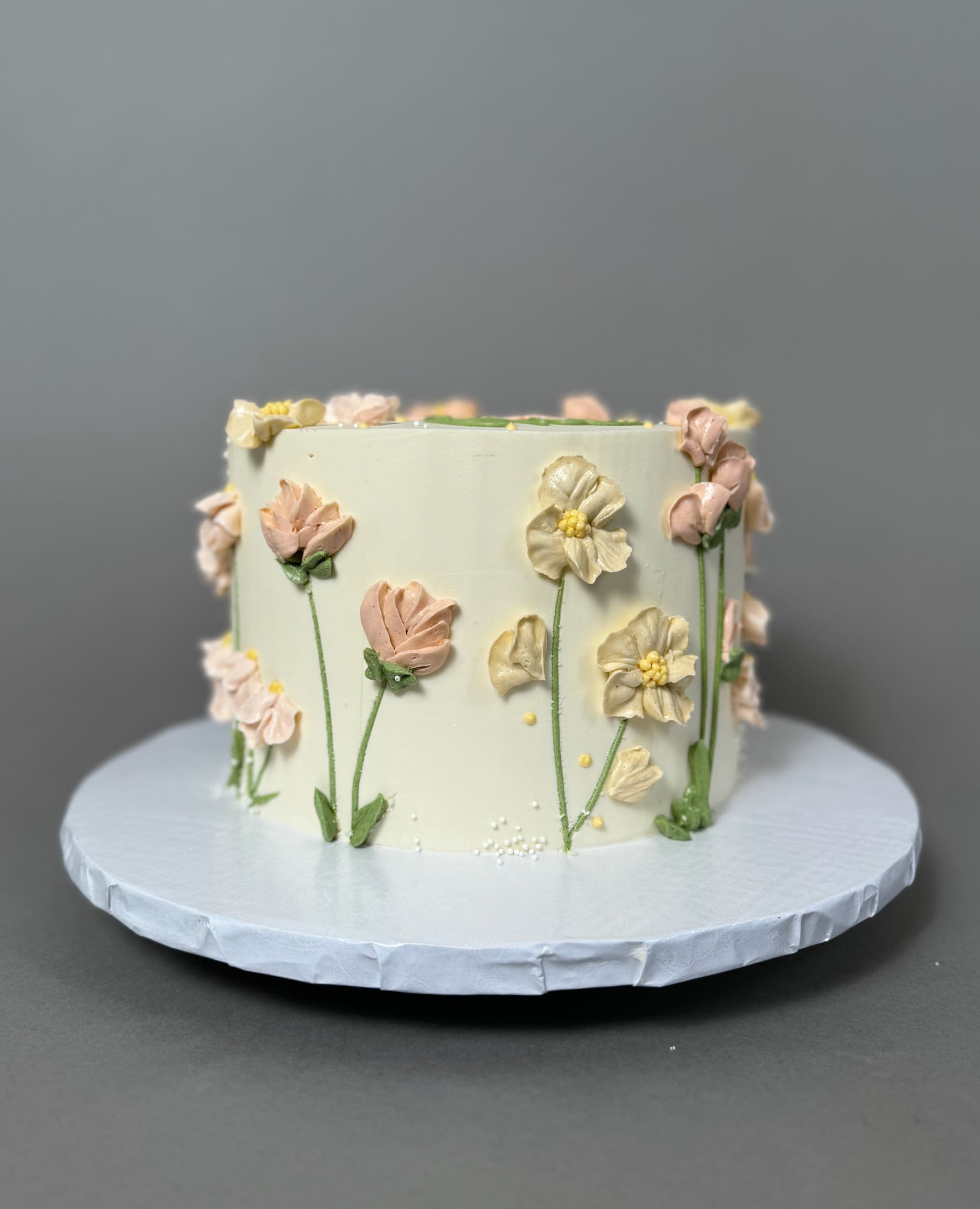 Hand piped flower meadow - custom cake