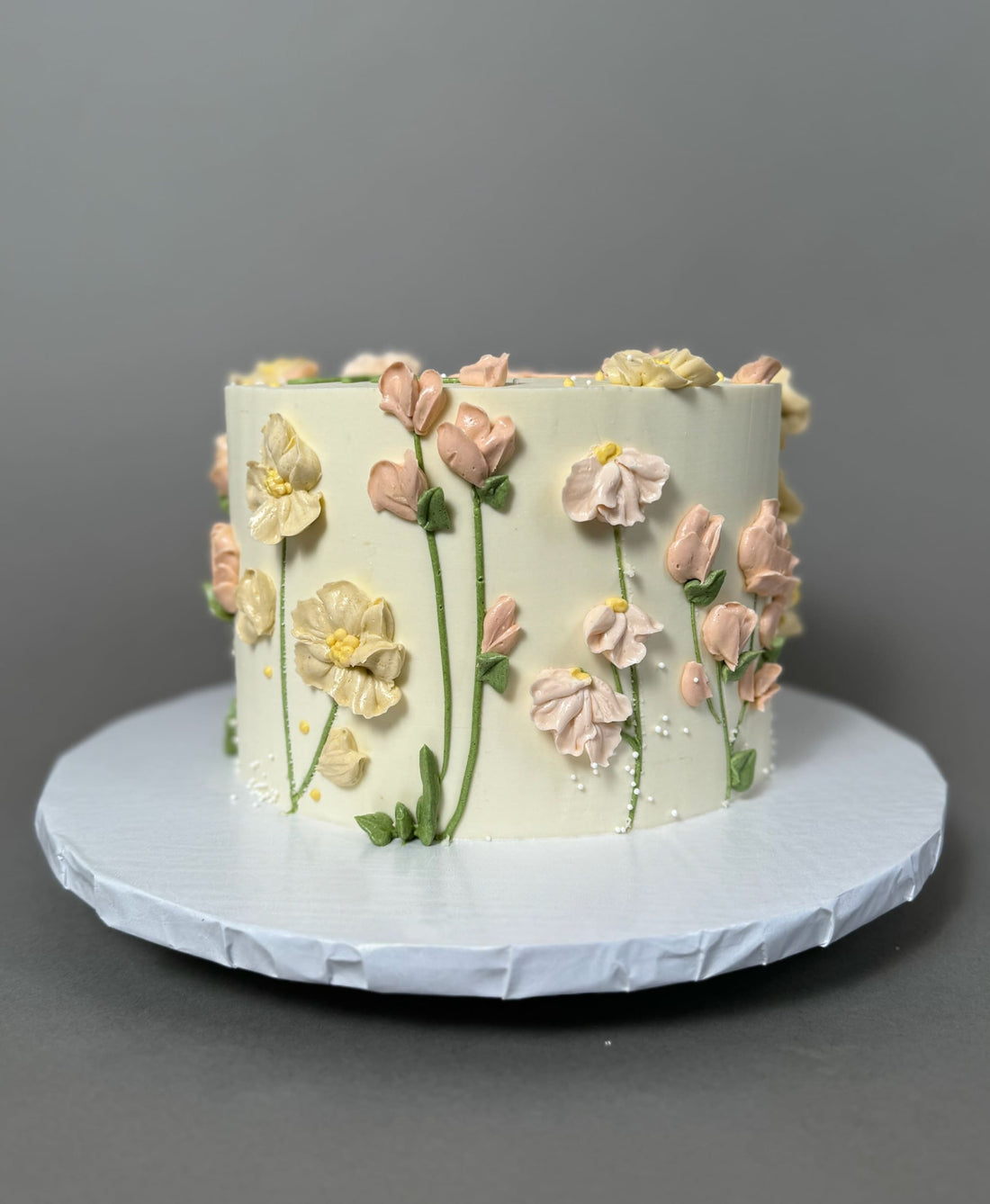 Hand piped flower meadow - custom cake