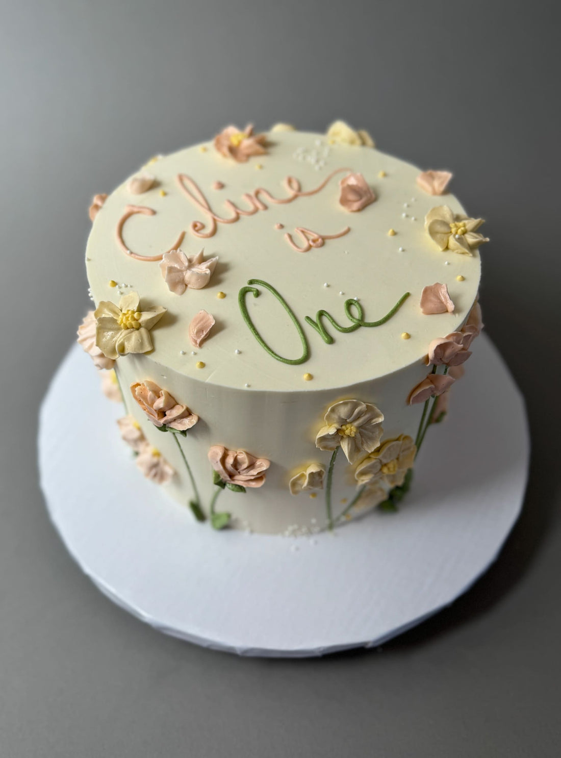 Hand piped flower meadow - custom cake