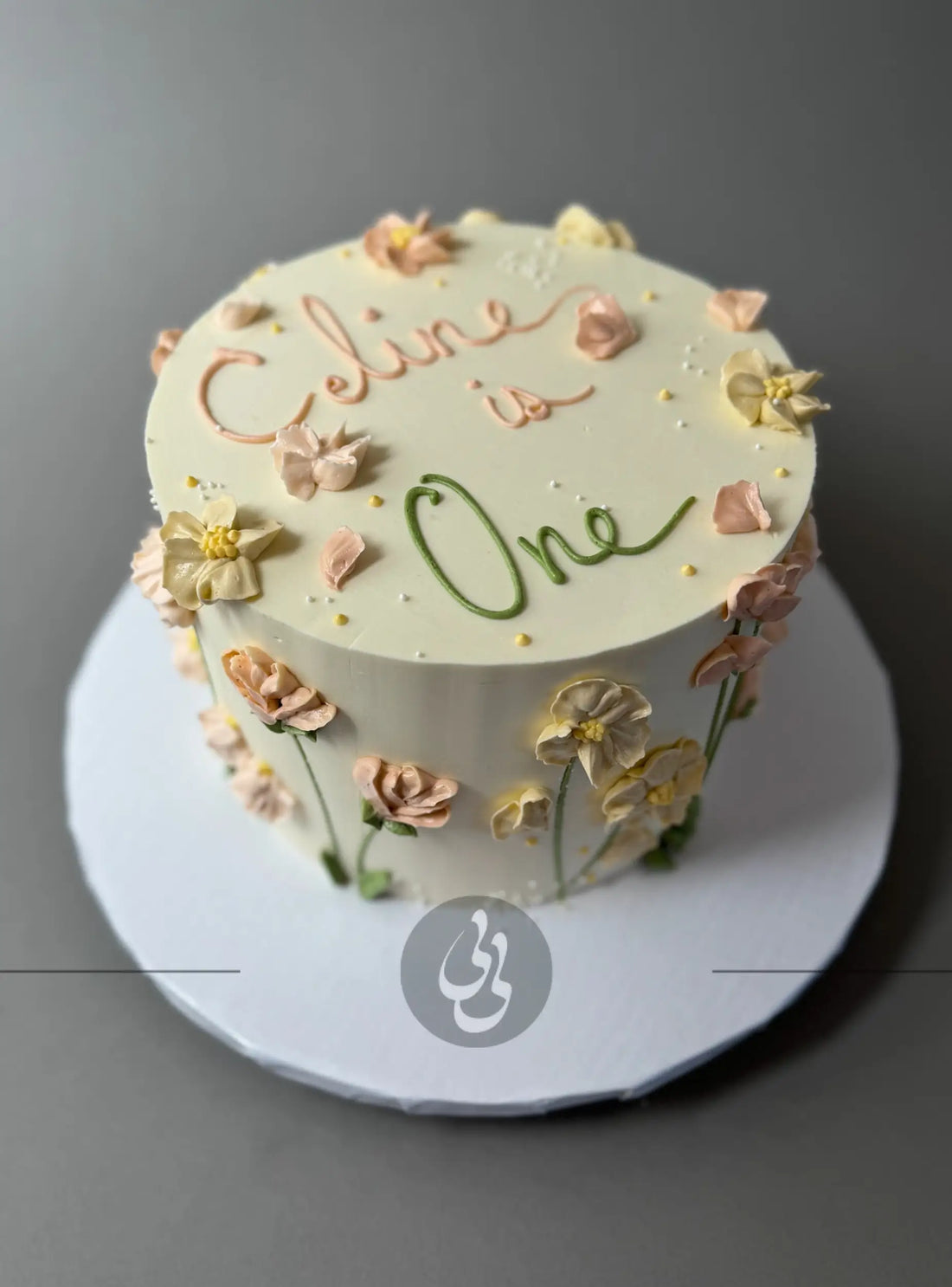 Hand piped flower meadow - custom cake