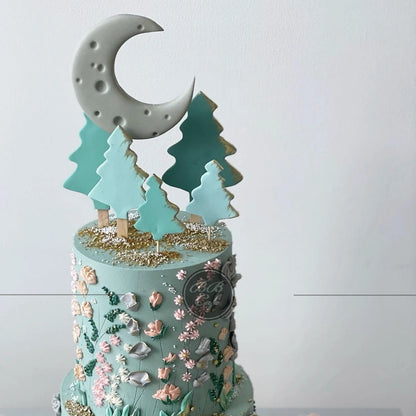 Hand piped meadow flowers &amp; moon - custom cake