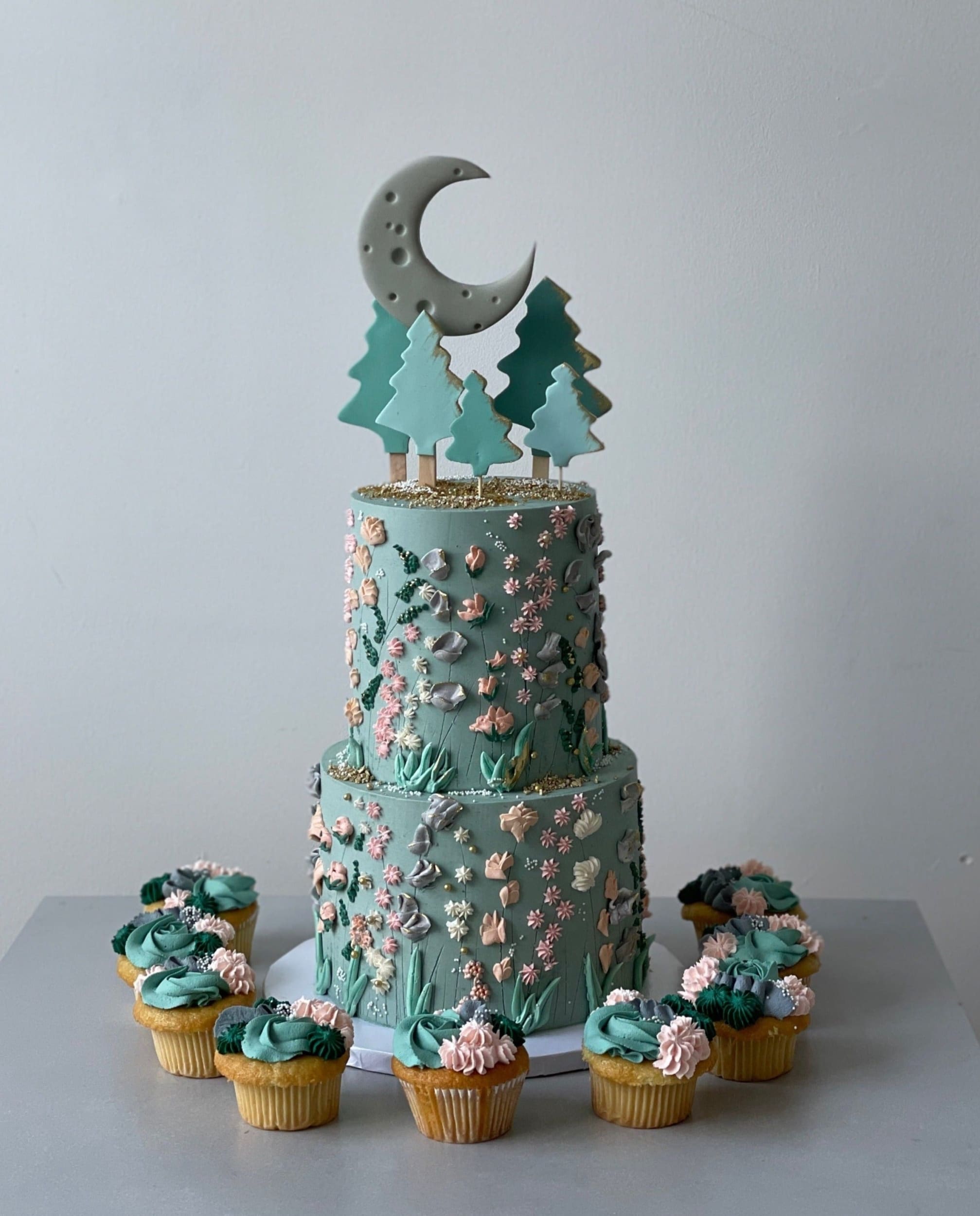 Hand piped meadow flowers &amp; moon - custom cake