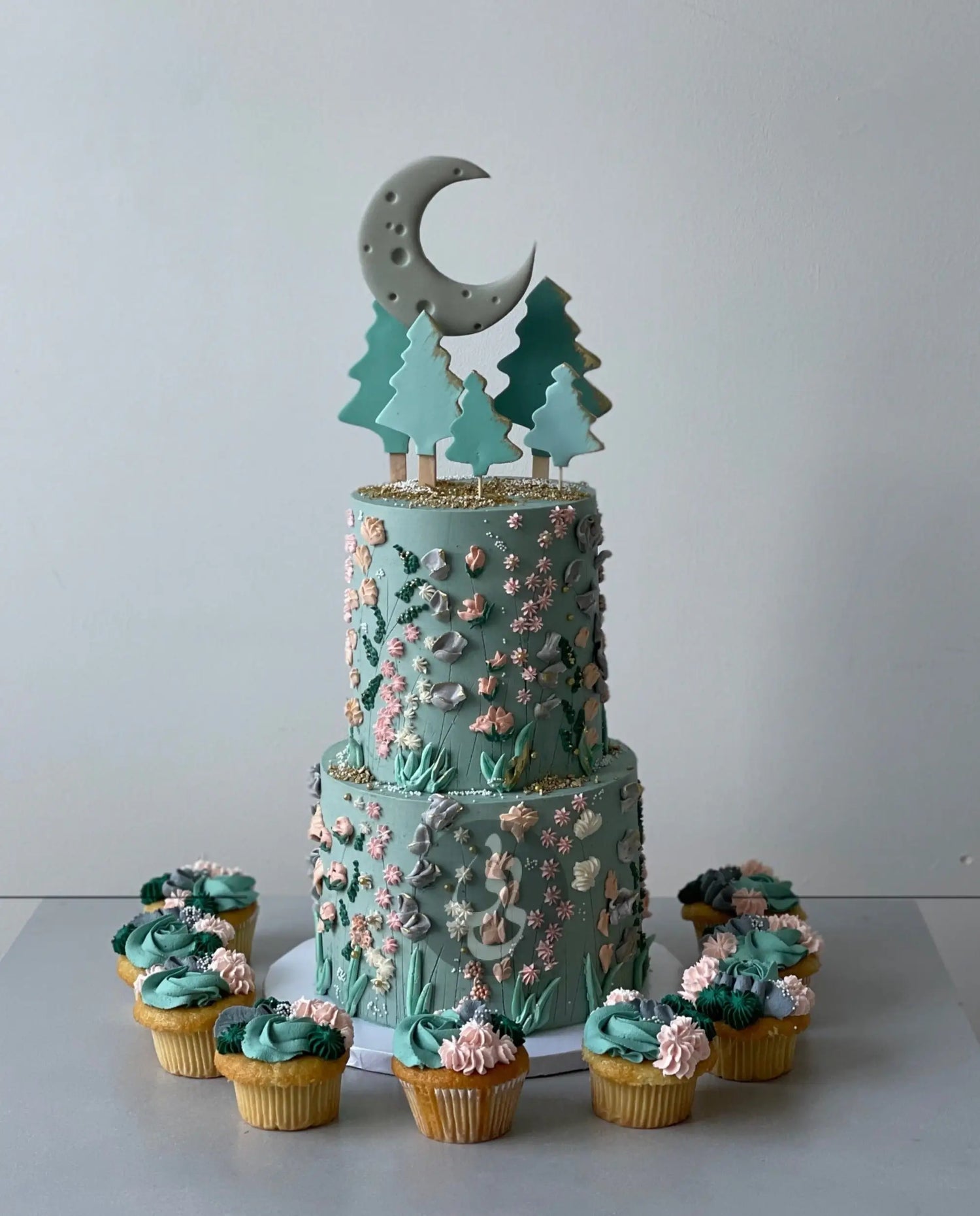 Hand piped meadow flowers &amp; moon - custom cake