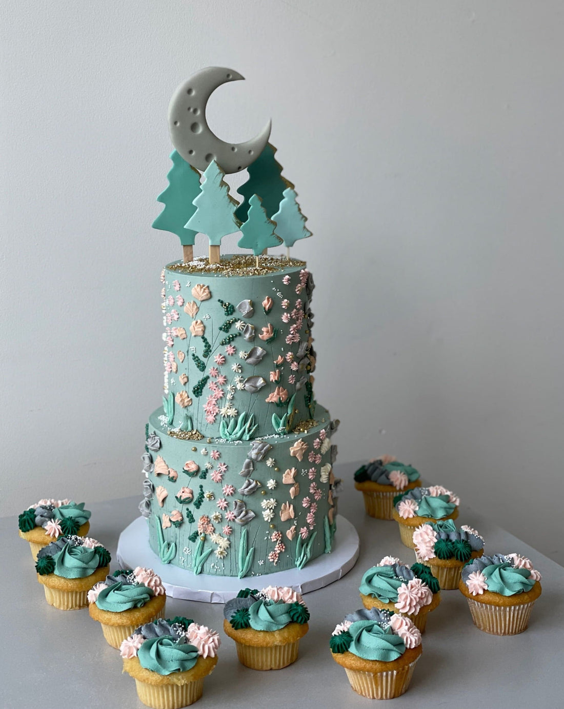 Hand piped meadow flowers &amp; moon - custom cake