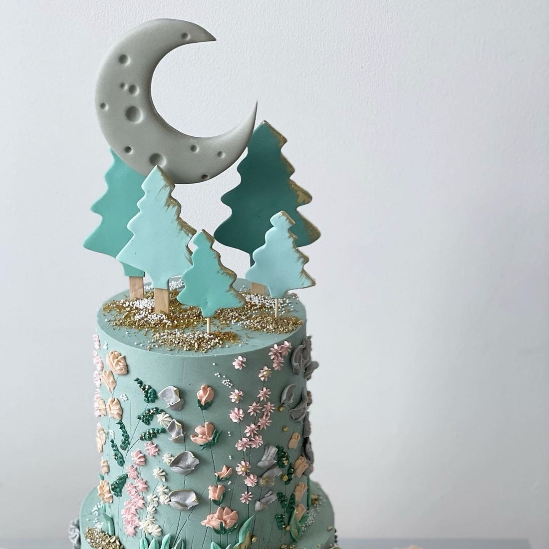Hand piped meadow flowers &amp; moon - custom cake