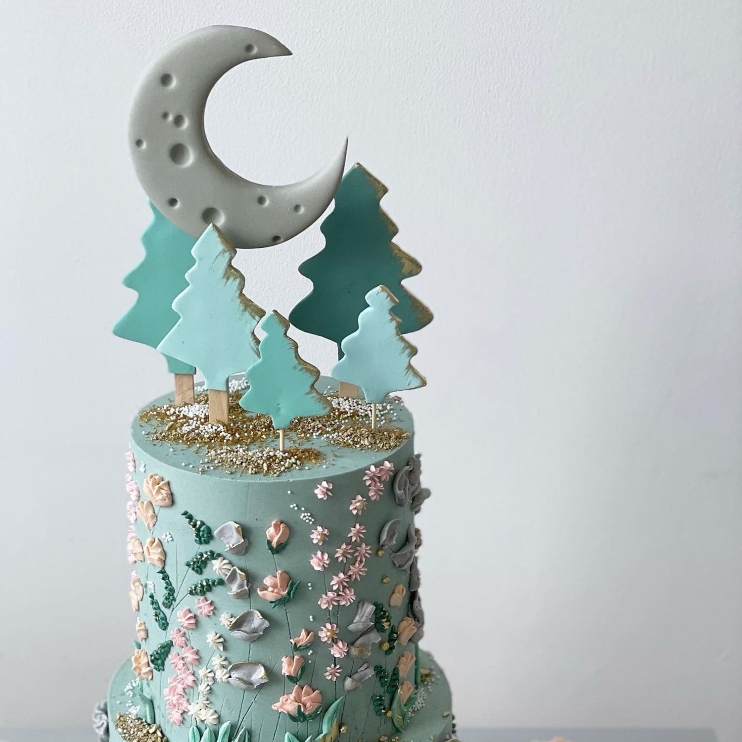 Hand piped meadow flowers &amp; moon - custom cake