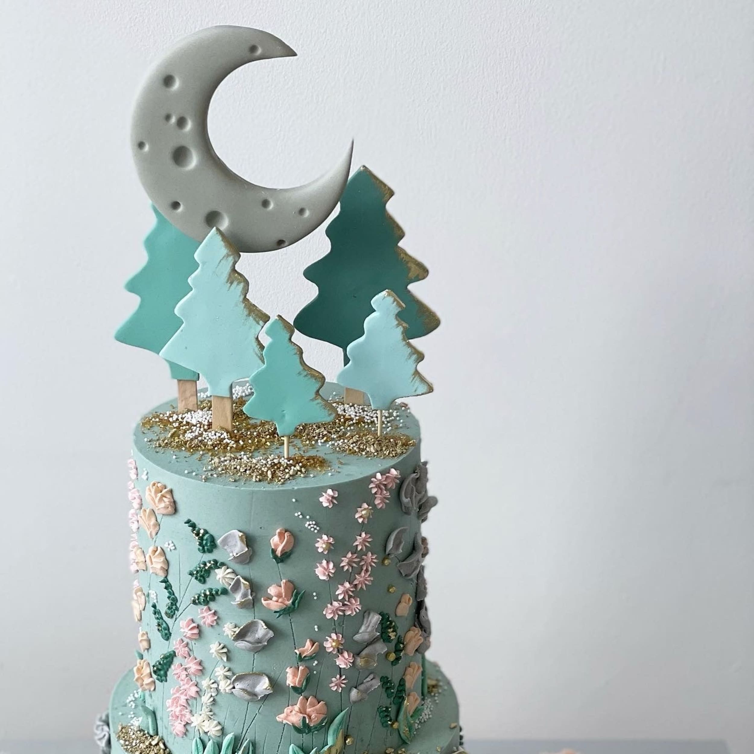 Hand piped meadow flowers &amp; moon - custom cake