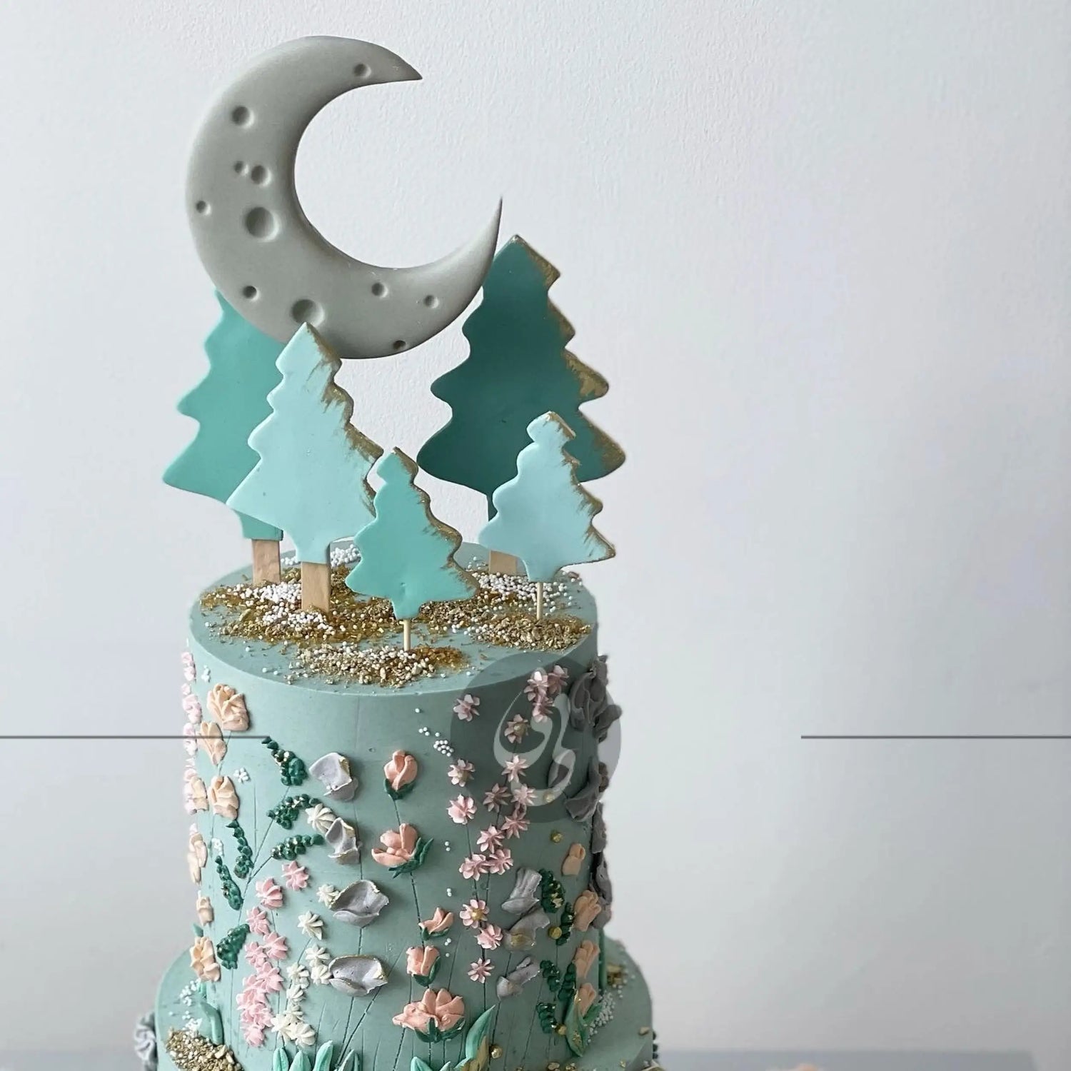 Hand piped meadow flowers &amp; moon - custom cake